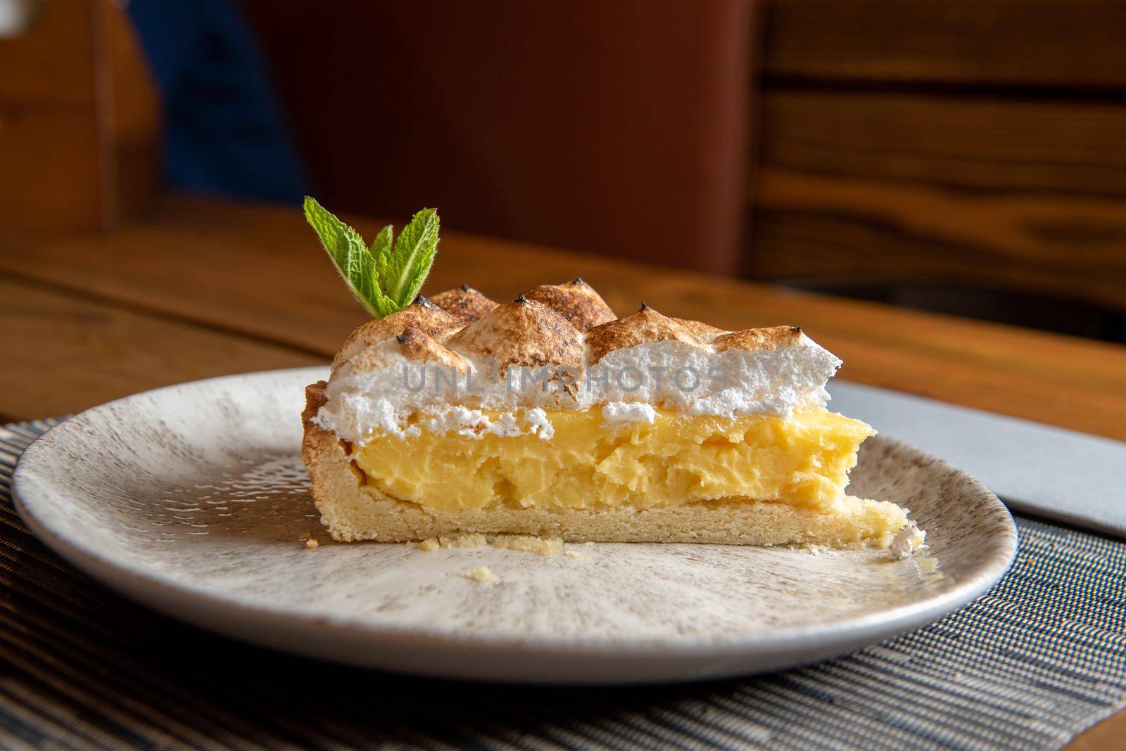Dessert with meringue and lemon.