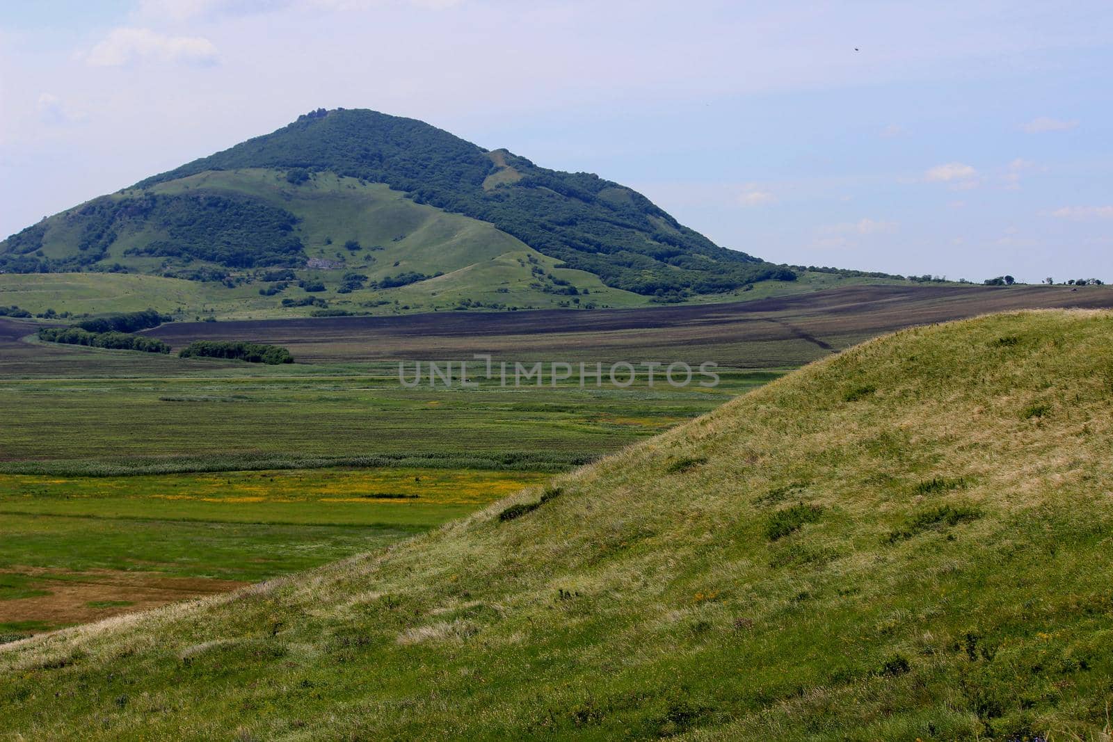 Mountain landscape, road to the mountains. Travel in the mountains.