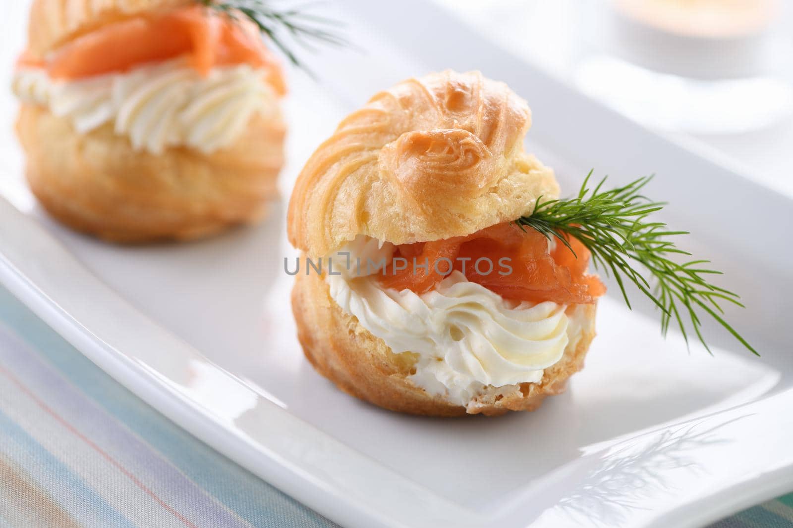 Profiteroles stuffed with cream cheese and salmon.