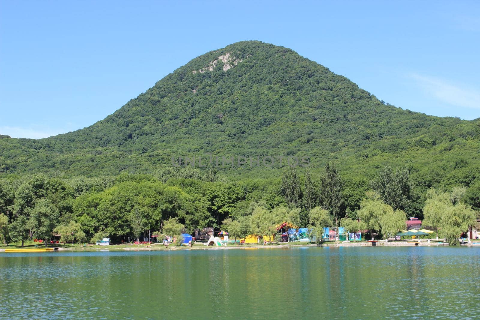 Park. The lake against the mountain. by Olga26