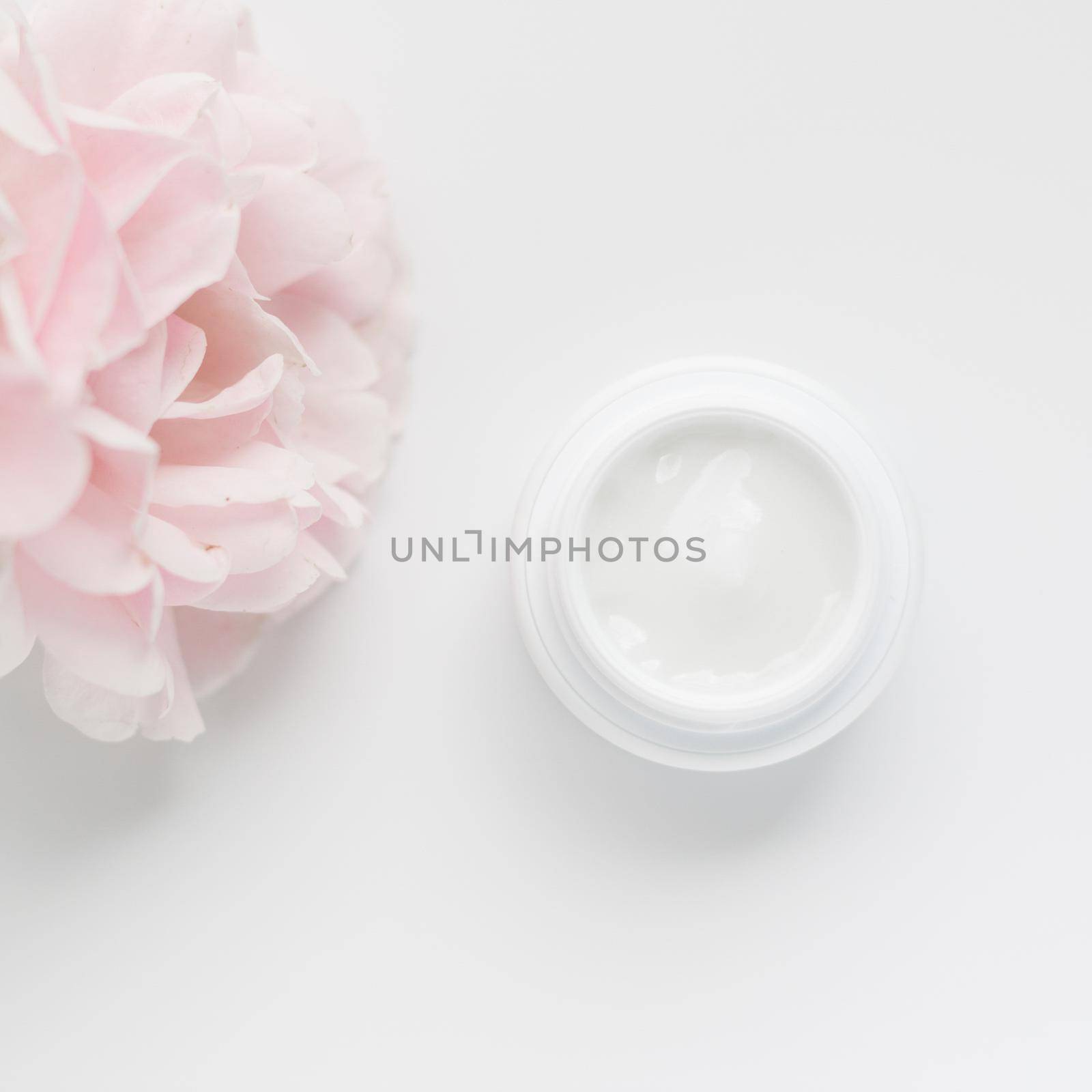 beauty cream jar and rose petals - cosmetics with flowers styled concept