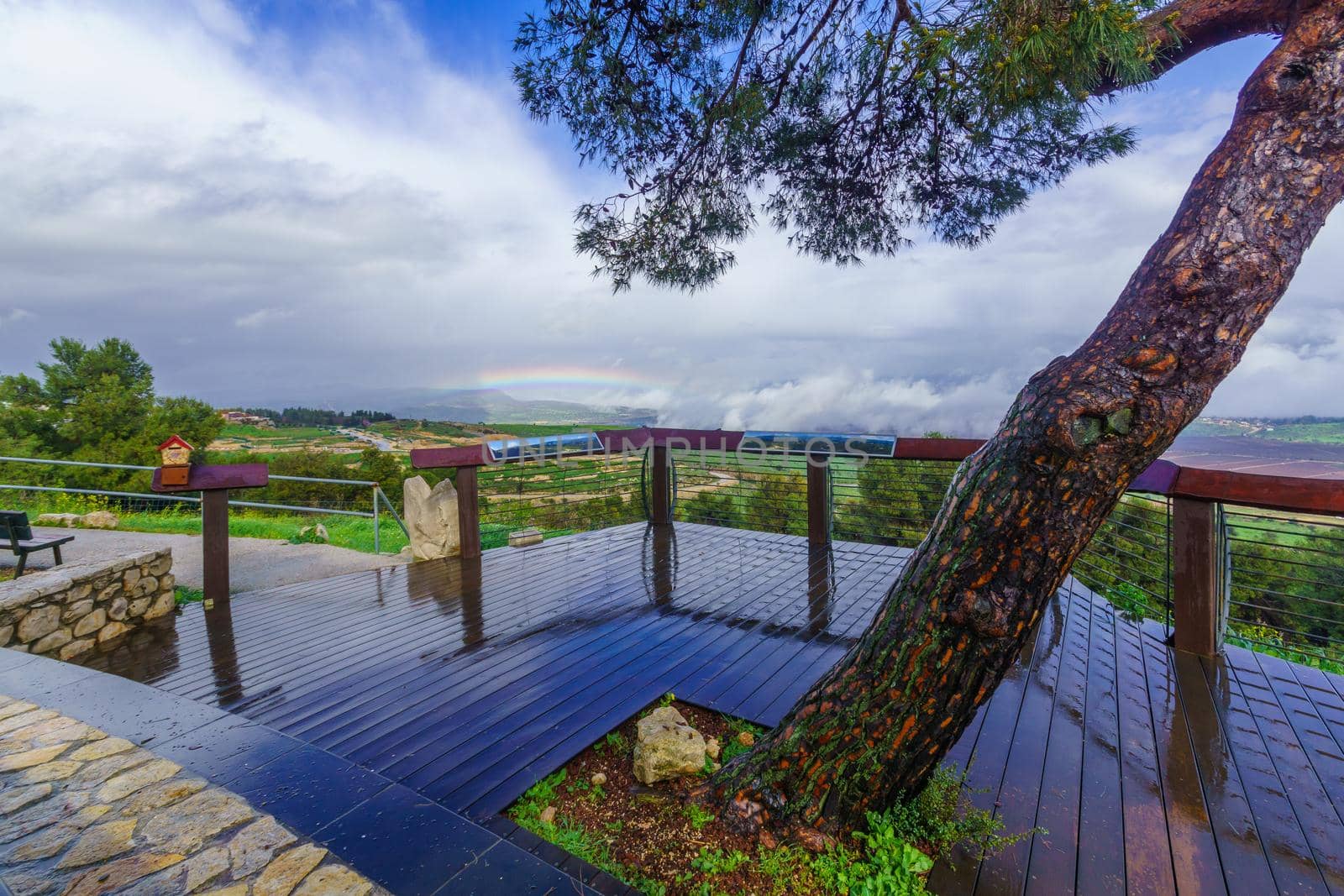 Malkia, Israel - February 18, 2021: View of the Malkia observation point, with a rainbow and the Kedesh valley, Upper Galilee, Northern Israel