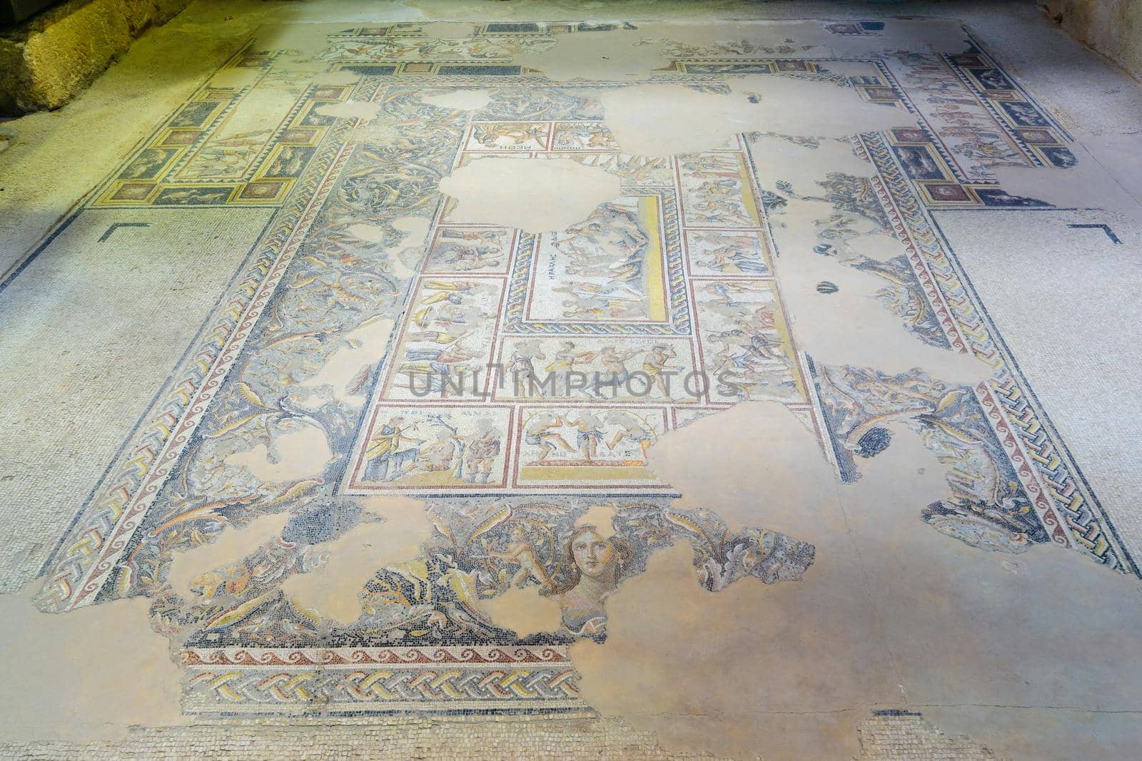 Tzipori, Israel - March 29, 2021: View of a Roman era mosaic floor of the Dionysus House, in Tzipori National Park, Northern Israel