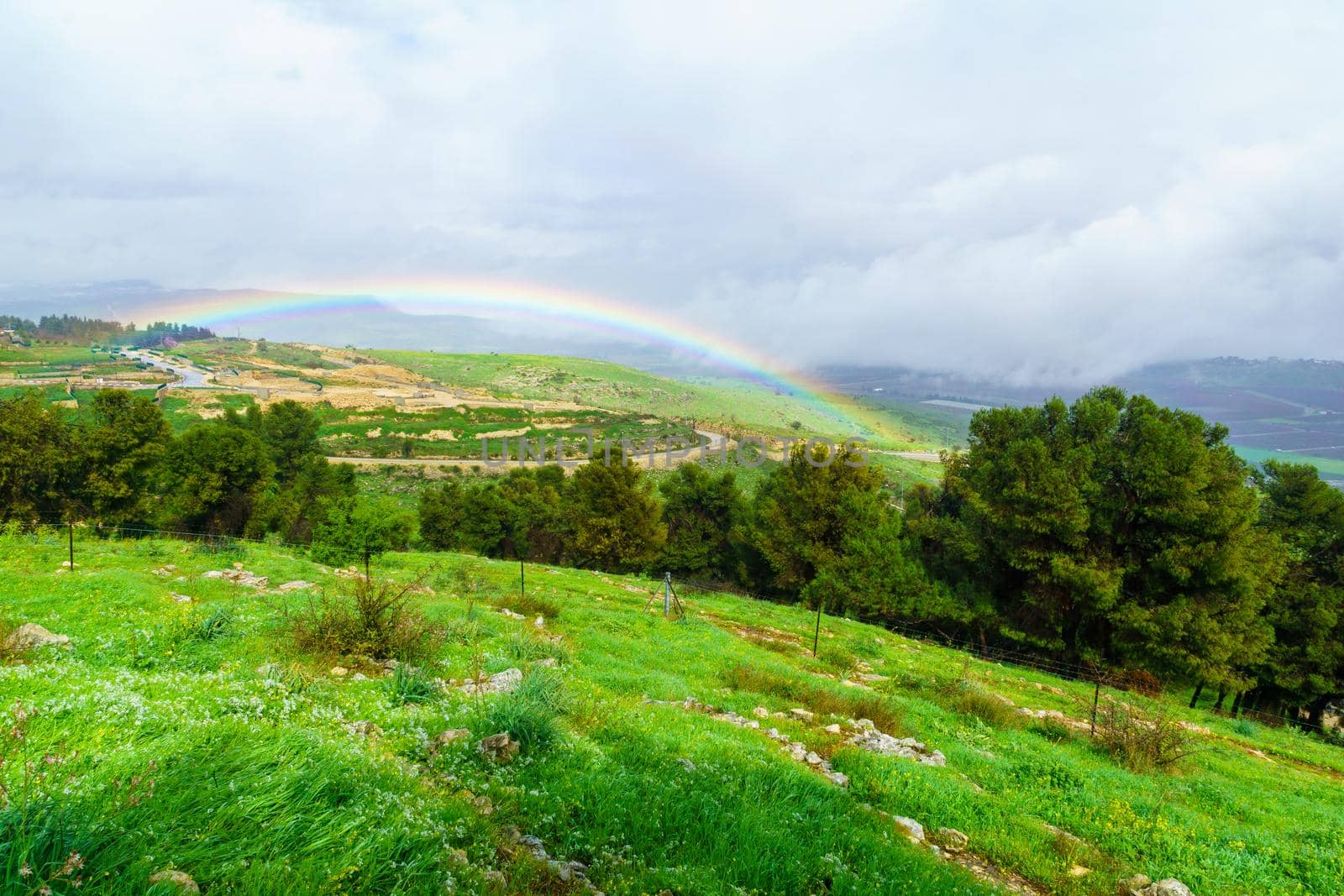View of a rainbow in the Kedesh valley, Upper Galilee, Northern Israel