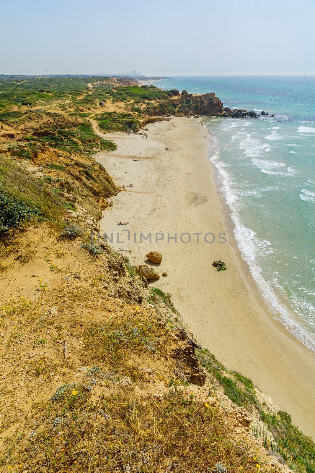 View of the beach and sandstone cliffs in Gedor Sea Reserve, Hadera, Northern Israel