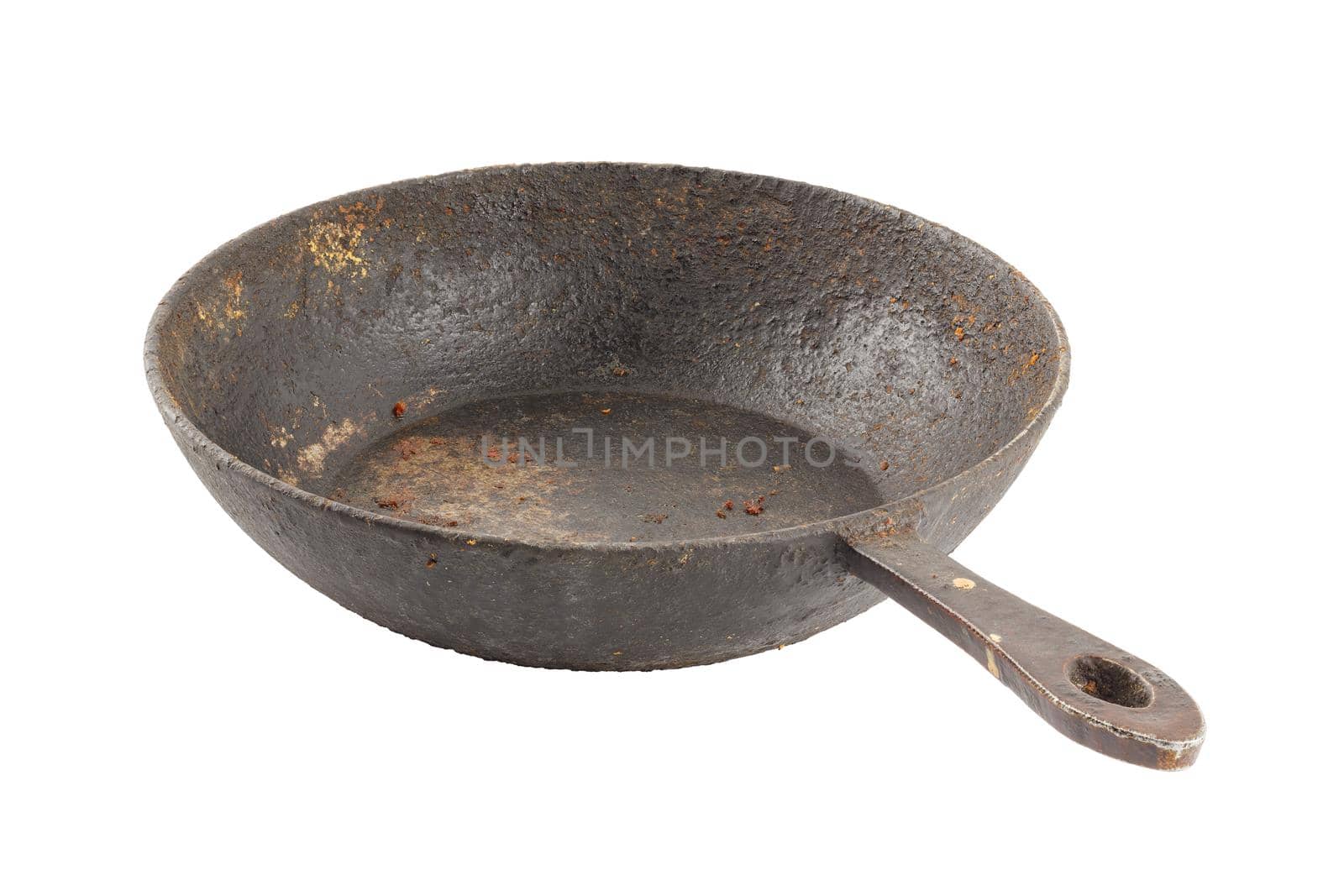 old disgusting stained rusty cast iron pan with burnt fat and food leftovers isolated on white background