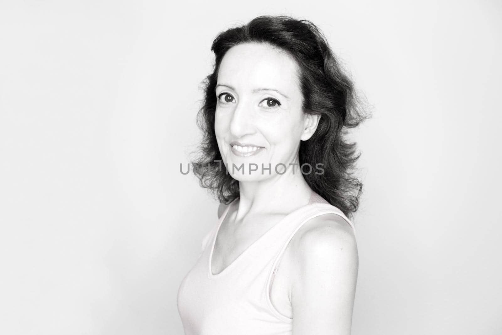 Portrait of woman with happy and positive expression. Copy space.
