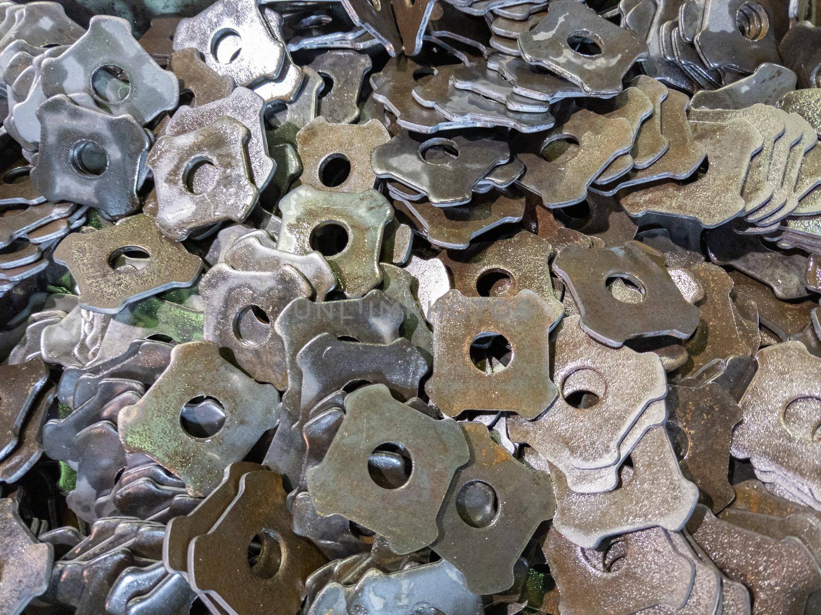 oiled thick sheet metal parts after cutting down on the press.