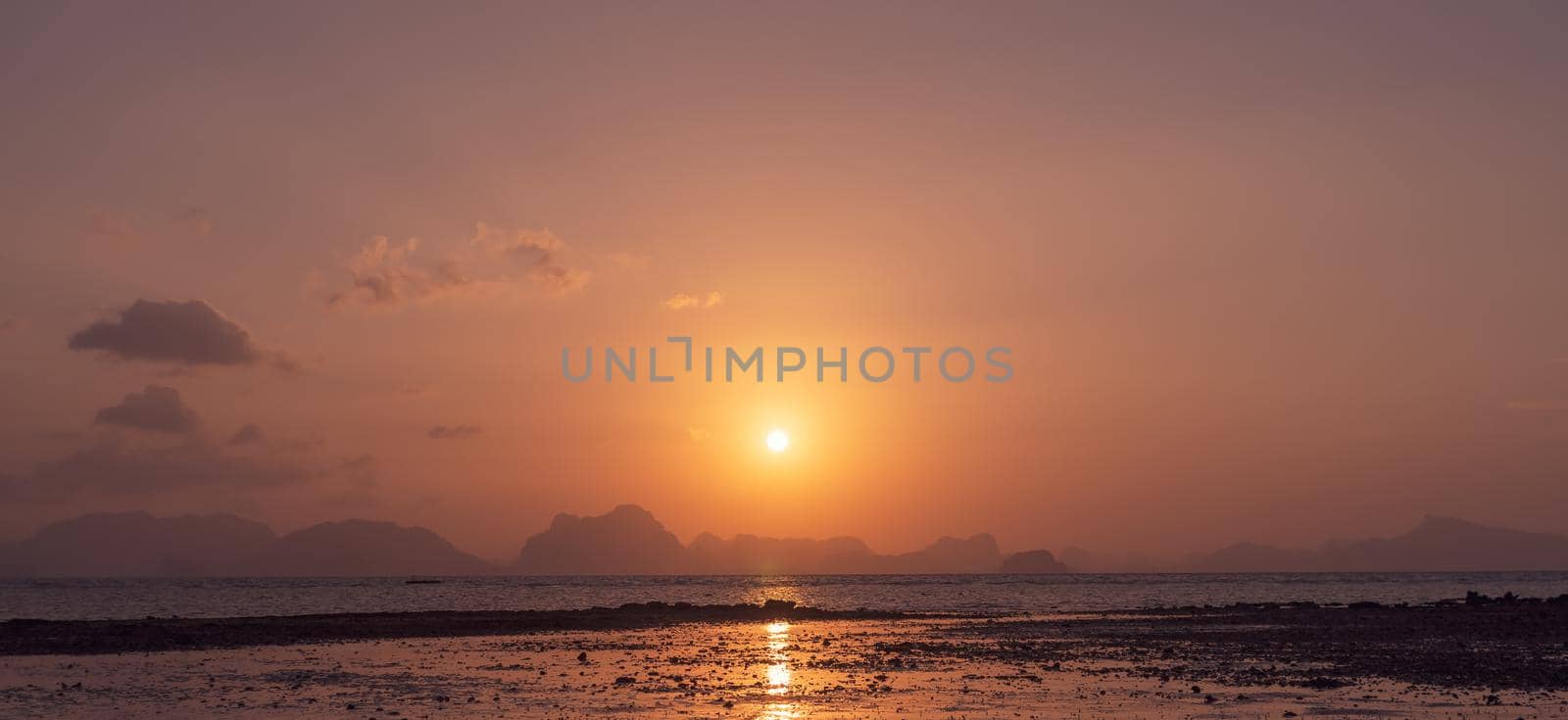 Tropical nature clean beach sunset sky time with sun light background.