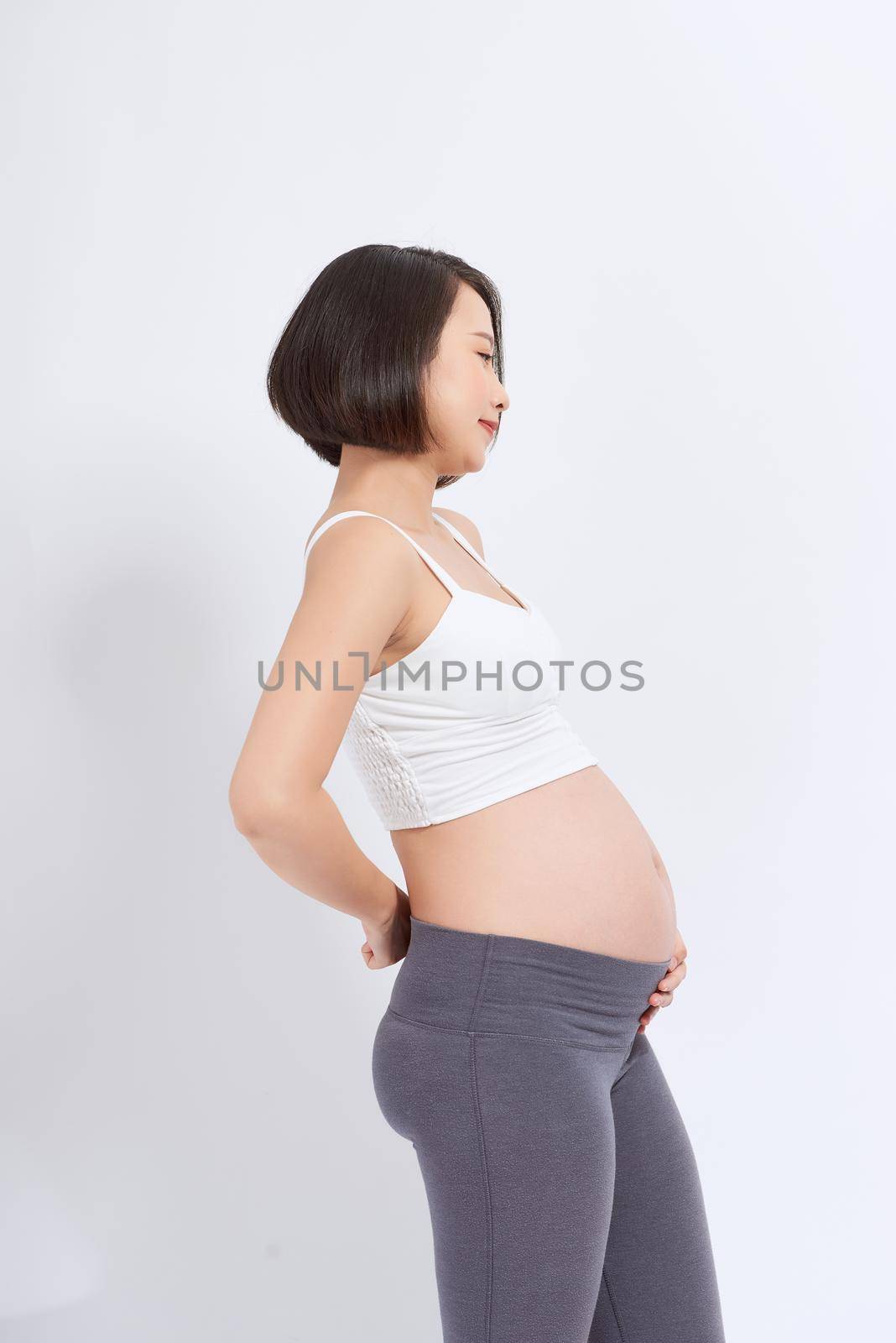 Pregnant female having back pain by makidotvn
