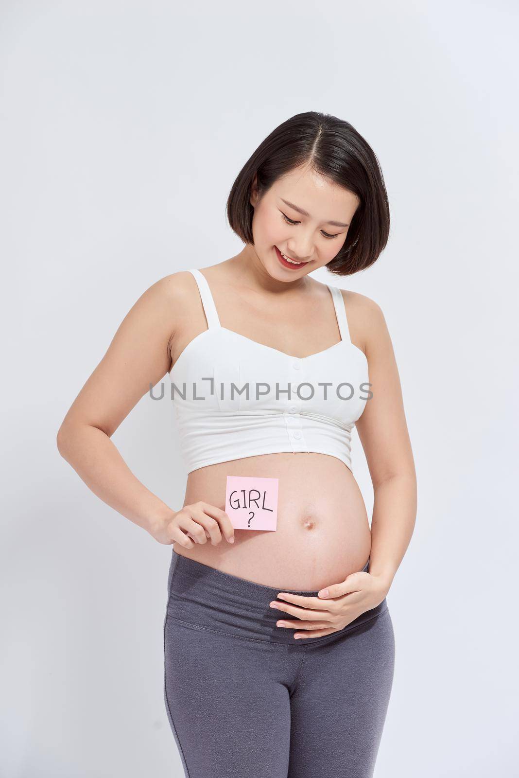 Pregnant woman with stickers over white by makidotvn