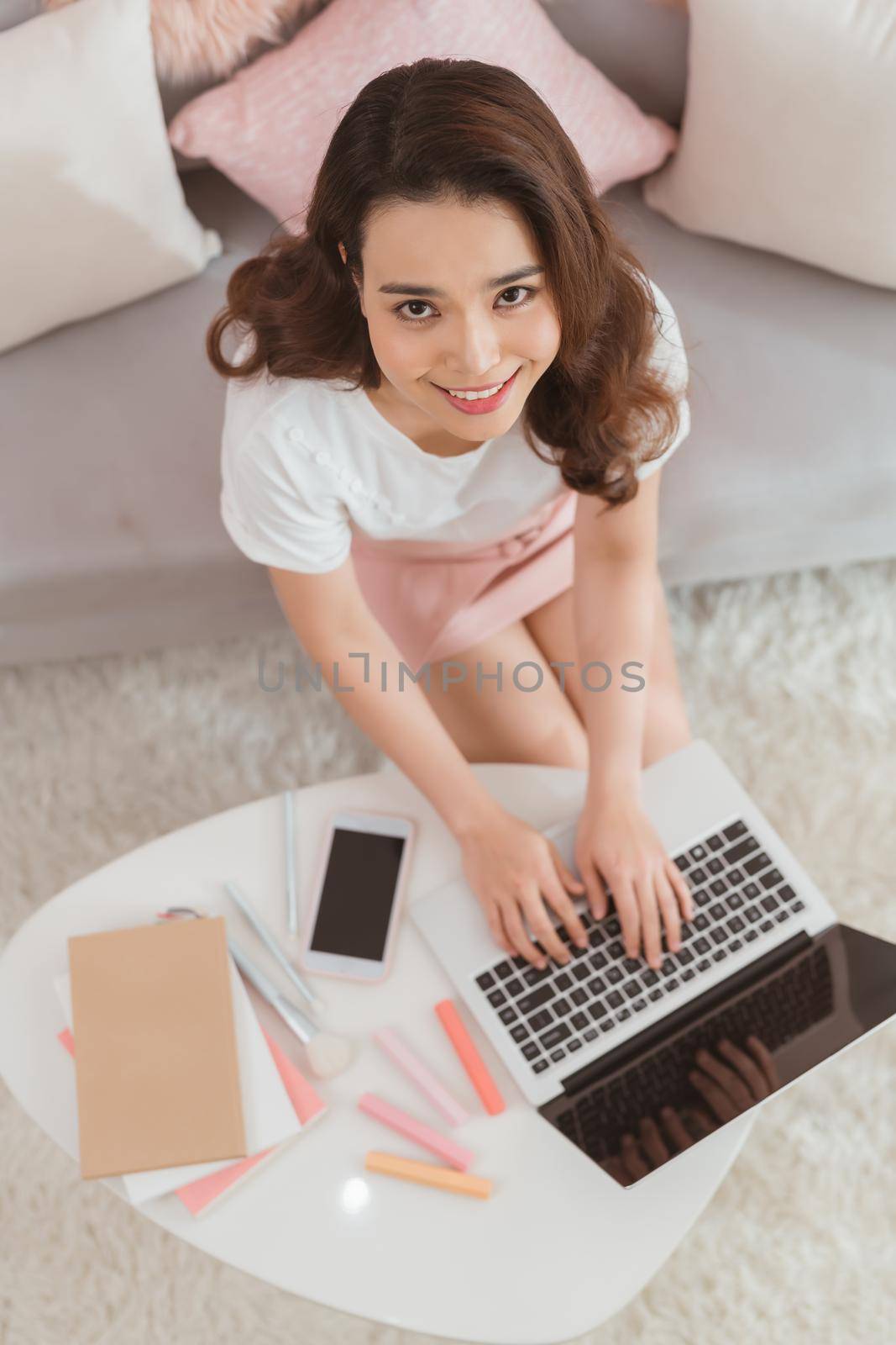 elegant asian lady freelance worker typing on laptop computer replying message online shop customer service internet by makidotvn