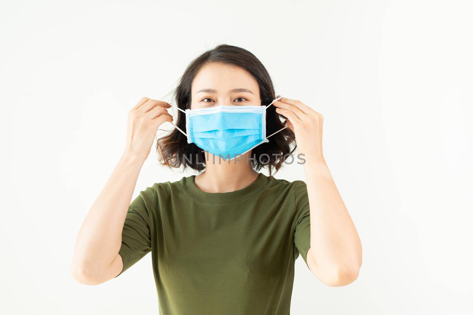 A Woman wears a mask to protect from virus, asian beauty, white background