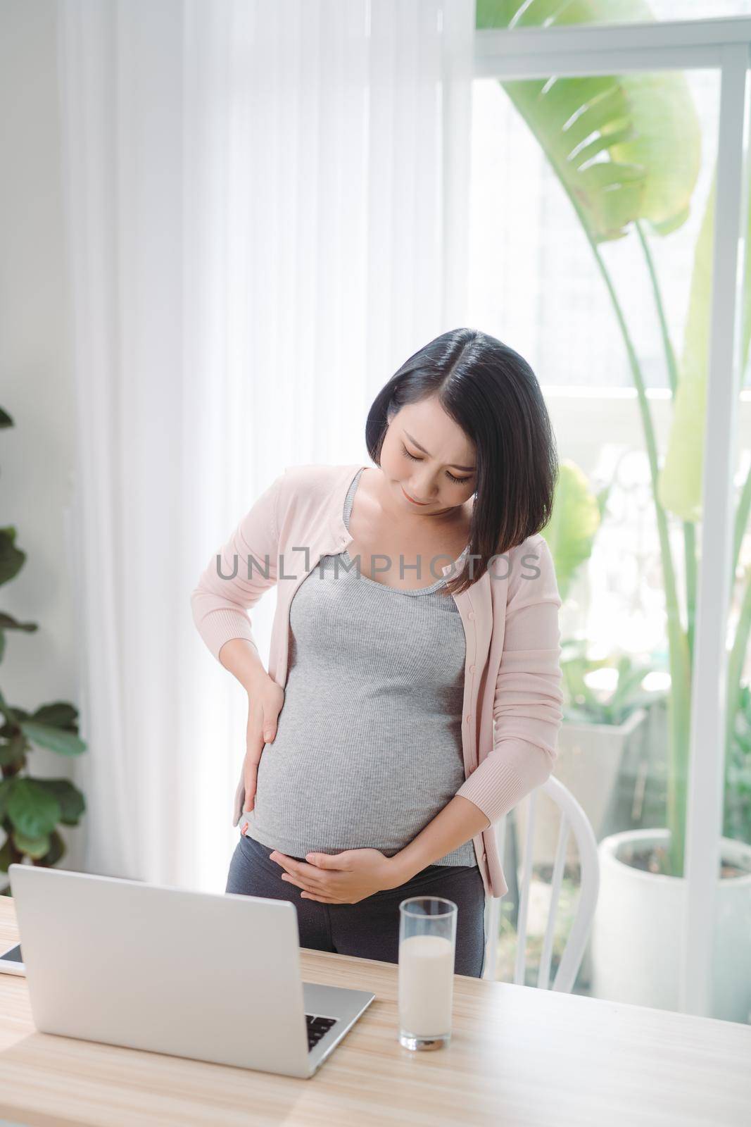 Active pregnant woman lifestyle and activity at home concept