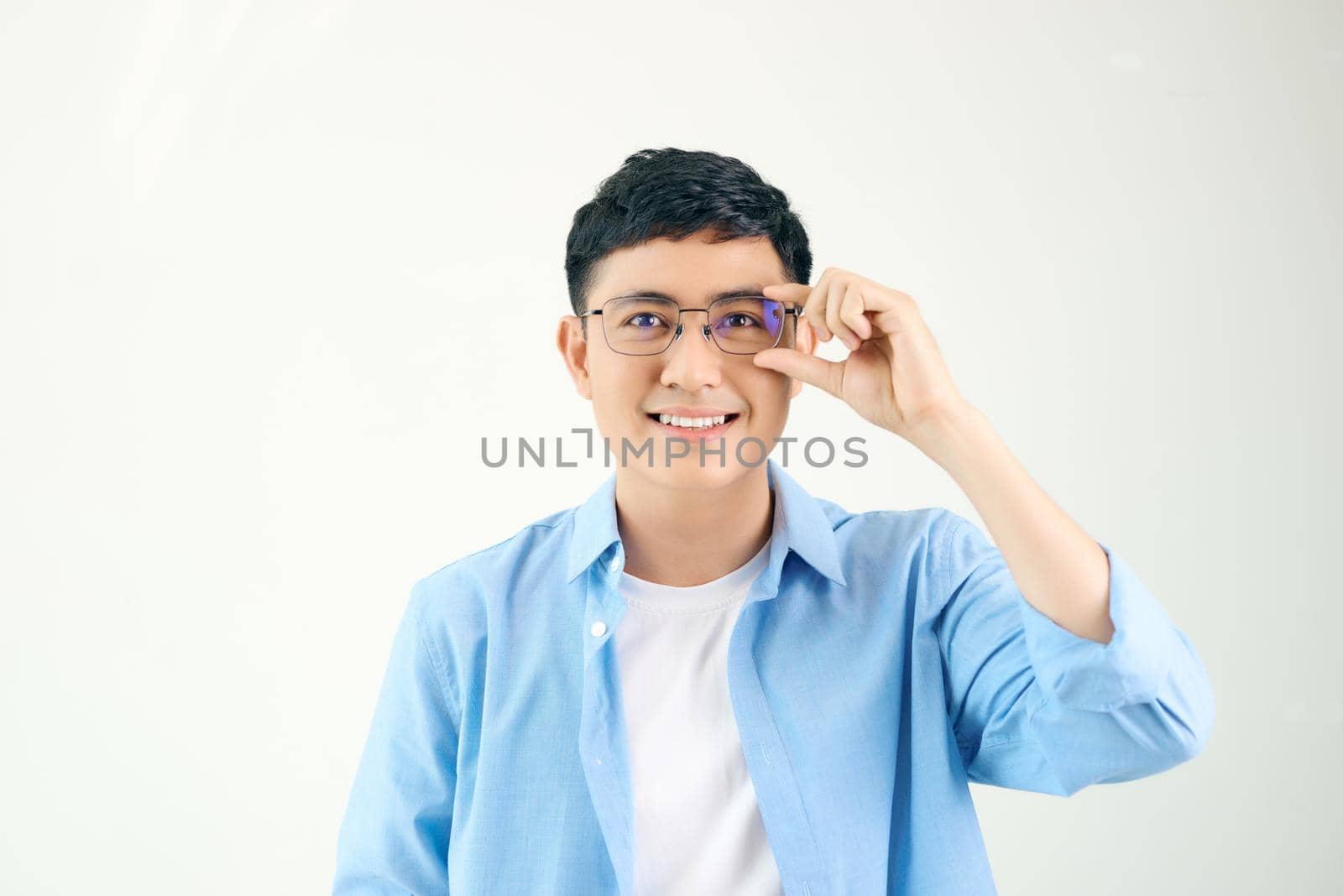 Happy Young Asian man smiling wearing glasses, isolated on white background