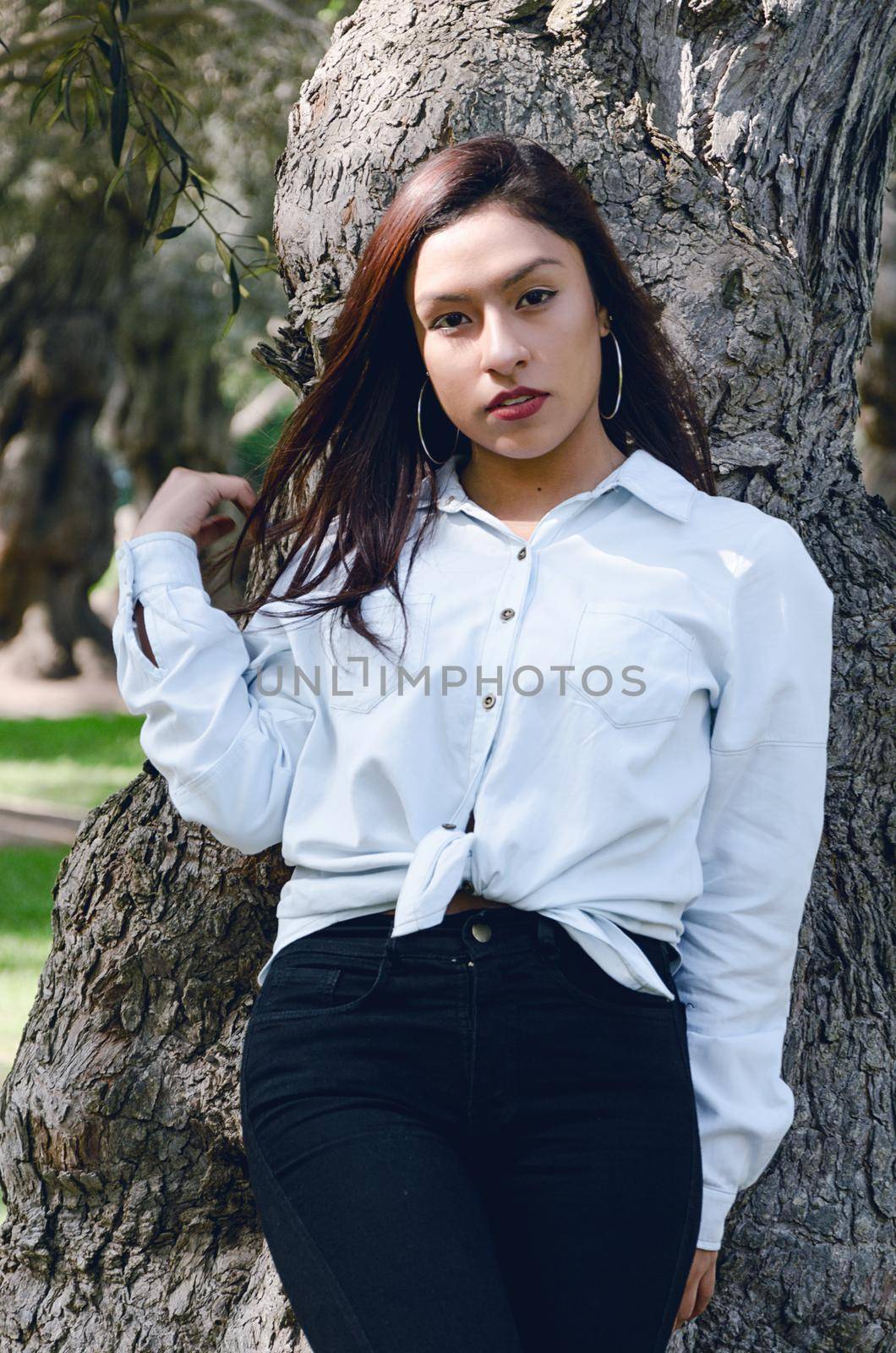 Fine art soft warm colors portrait of young tender innocent teenager girl with kind lovely face.