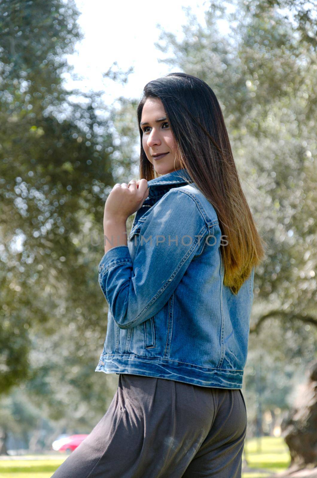 woman autumn portrait. fashion girl outdoor. Autumn woman having fun at the park and smiling. young woman portrait in autumn color