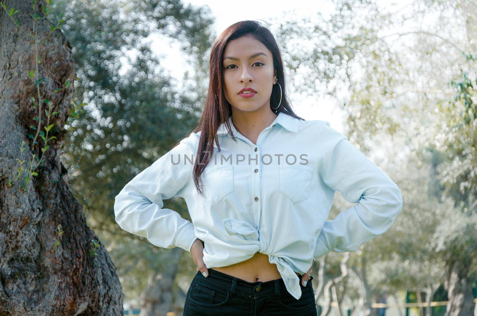 Fine art soft warm colors portrait of young tender innocent teenager girl with kind lovely face.