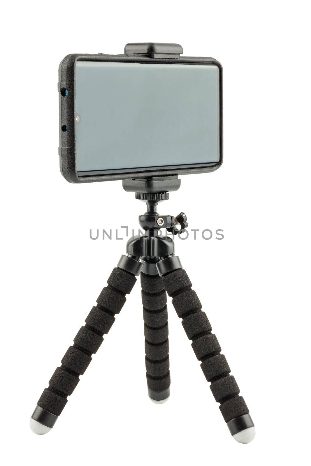 black cellphone in rugged rubber protective cover on small flexible tripod isolated on white background