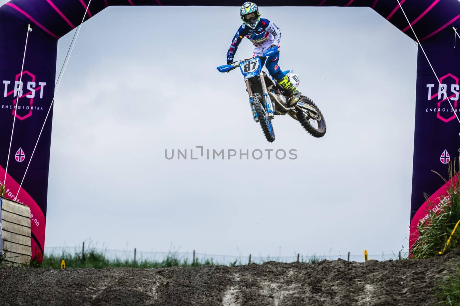 Motocross practise - air jump and high speed.