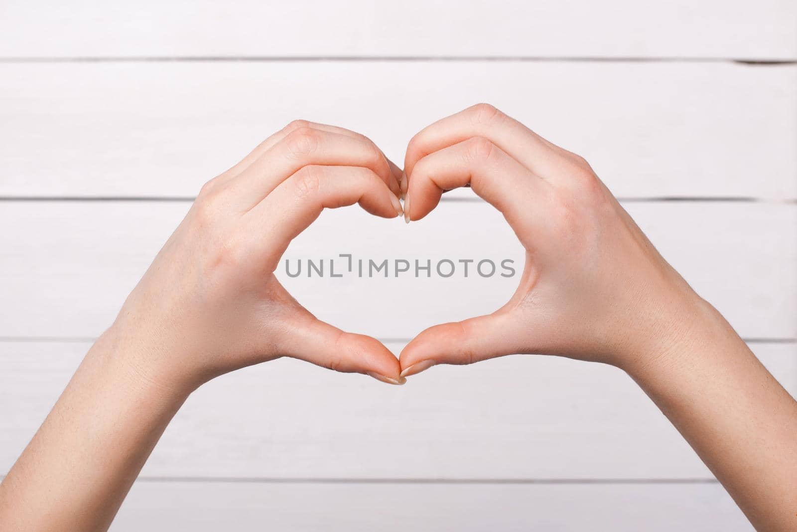 Ladies fingers show heart symbol. Love. by alones