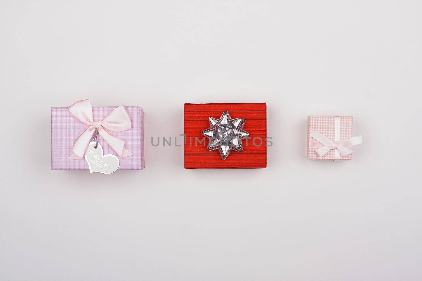 Three gifts on a white background.