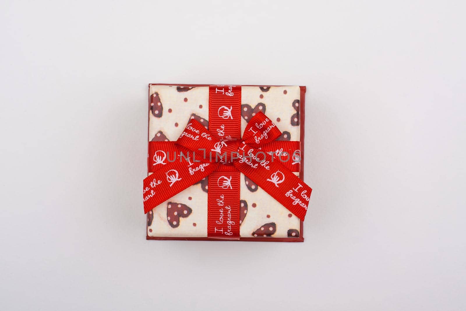 Vintage gift with bow lying on a white background. by alones