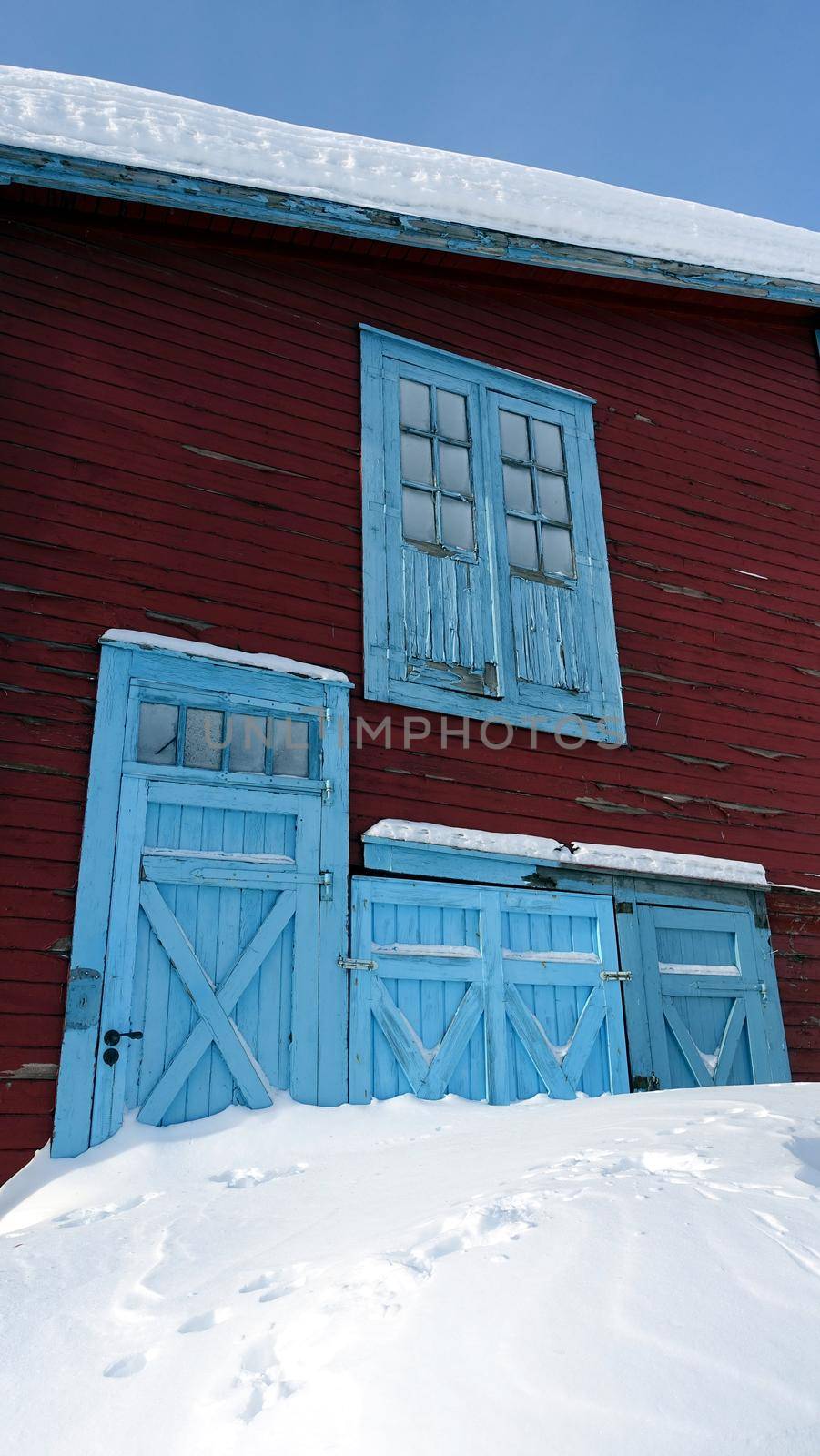 Historic building in the snowy center of Kiruna in northern Sweden during the winter