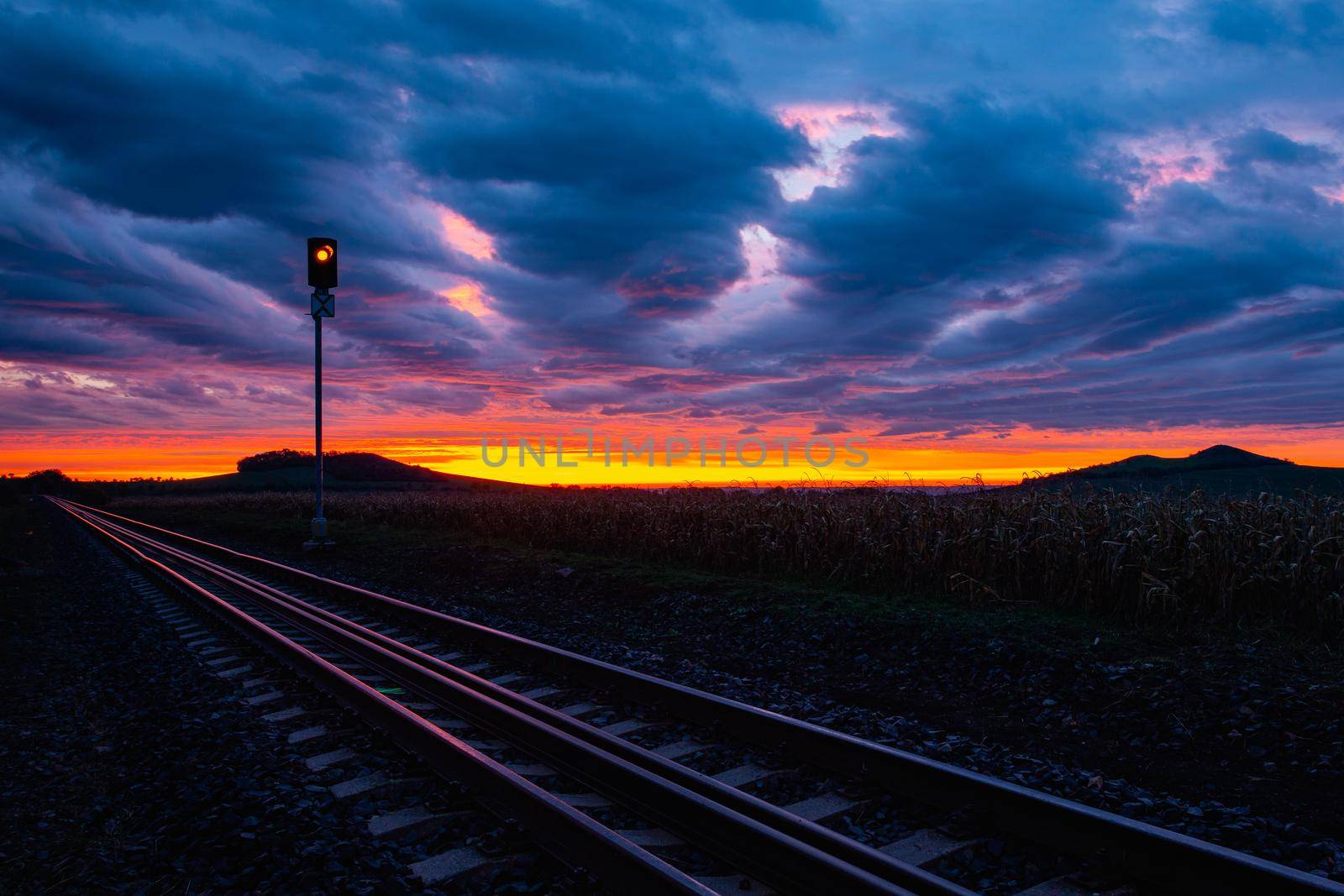 Morning train to the hell. Single railway track at sunrise by CaptureLight