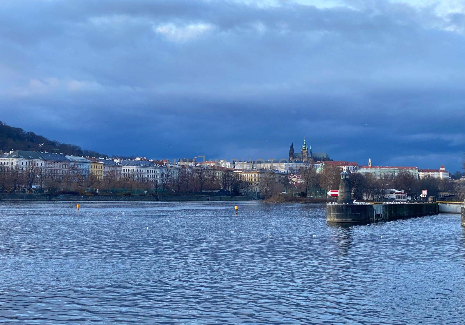 A view of the Prague Castle in the early evening, view from the Jirasek Bridge.