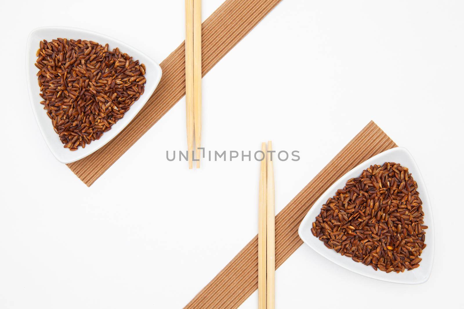 Top View Of White Sushi Plate With Rise And Chopsticks. Symmetry Food Design
