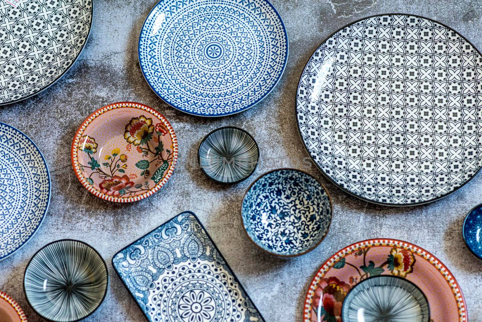 Beautiful traditional Moorish porcelain ceramic plates. illustrated middle eastern design. Marrakech Morocco. High quality photo