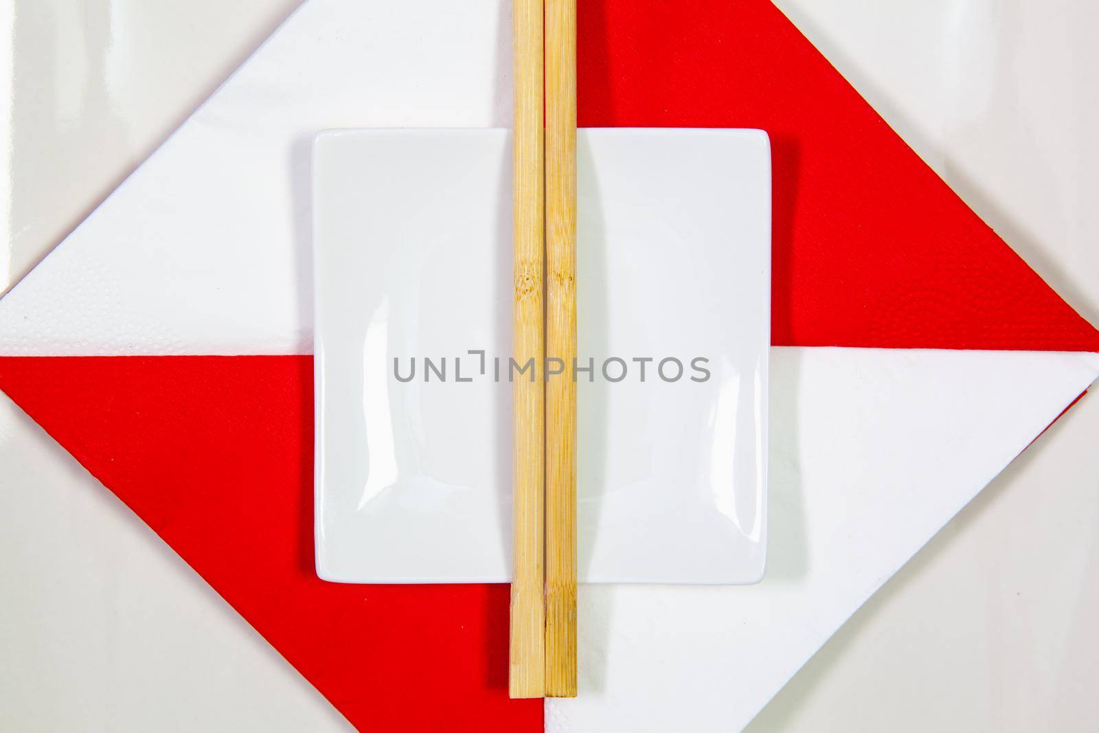 Ceramic bowls and bamboo chopsticks for sushi food  by CaptureLight