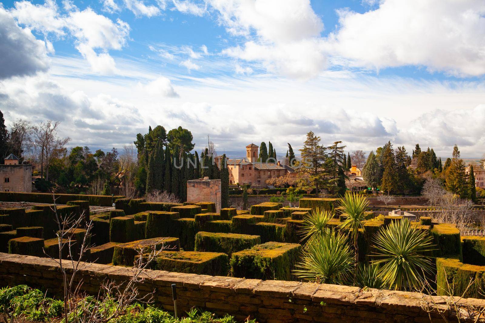 The Alhambra is a palace and fortress complex located in Granada, Andalusia, Spain. It was originally constructed as a small fortress in AD 889 on the remains of Roman fortifications