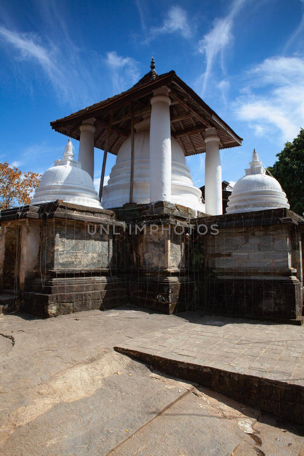 Gadaladenyia Vihara is an ancient Buddhist temple situated in Pilimathalawa, Kandy, Sri Lanka. Gadaladeniya is situated on top of a rocky outcrop.