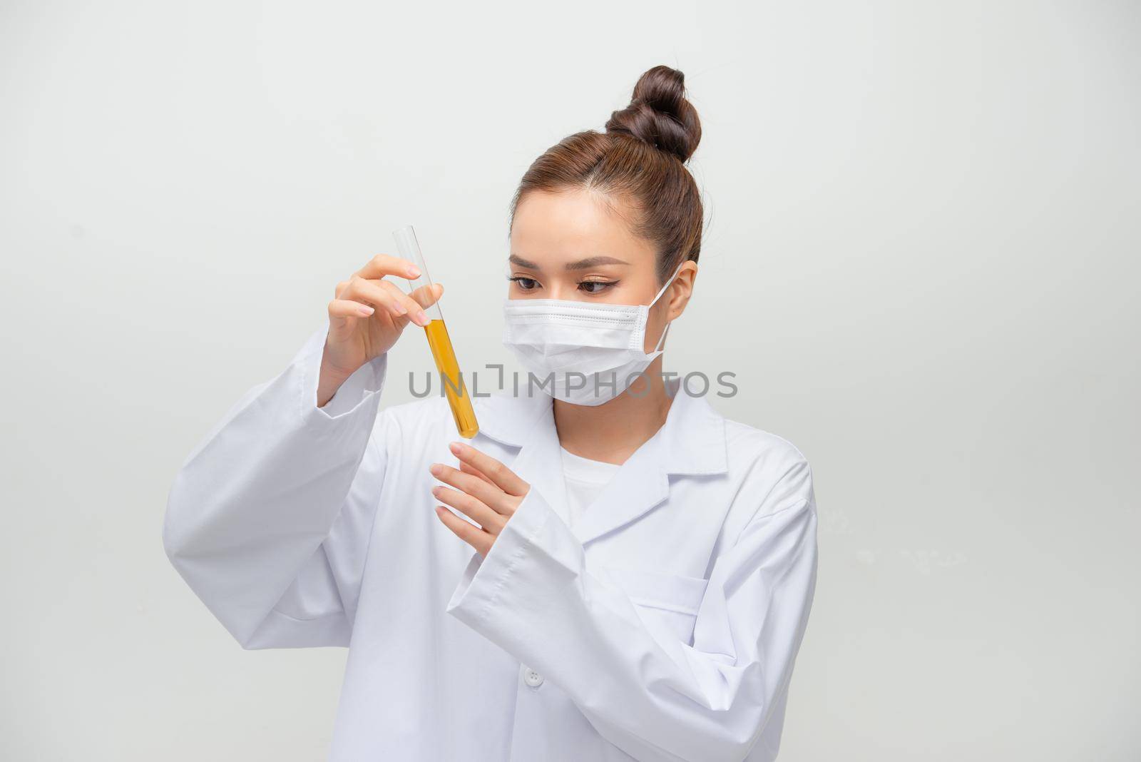 Woman doctor doing chemical tests in laboratory