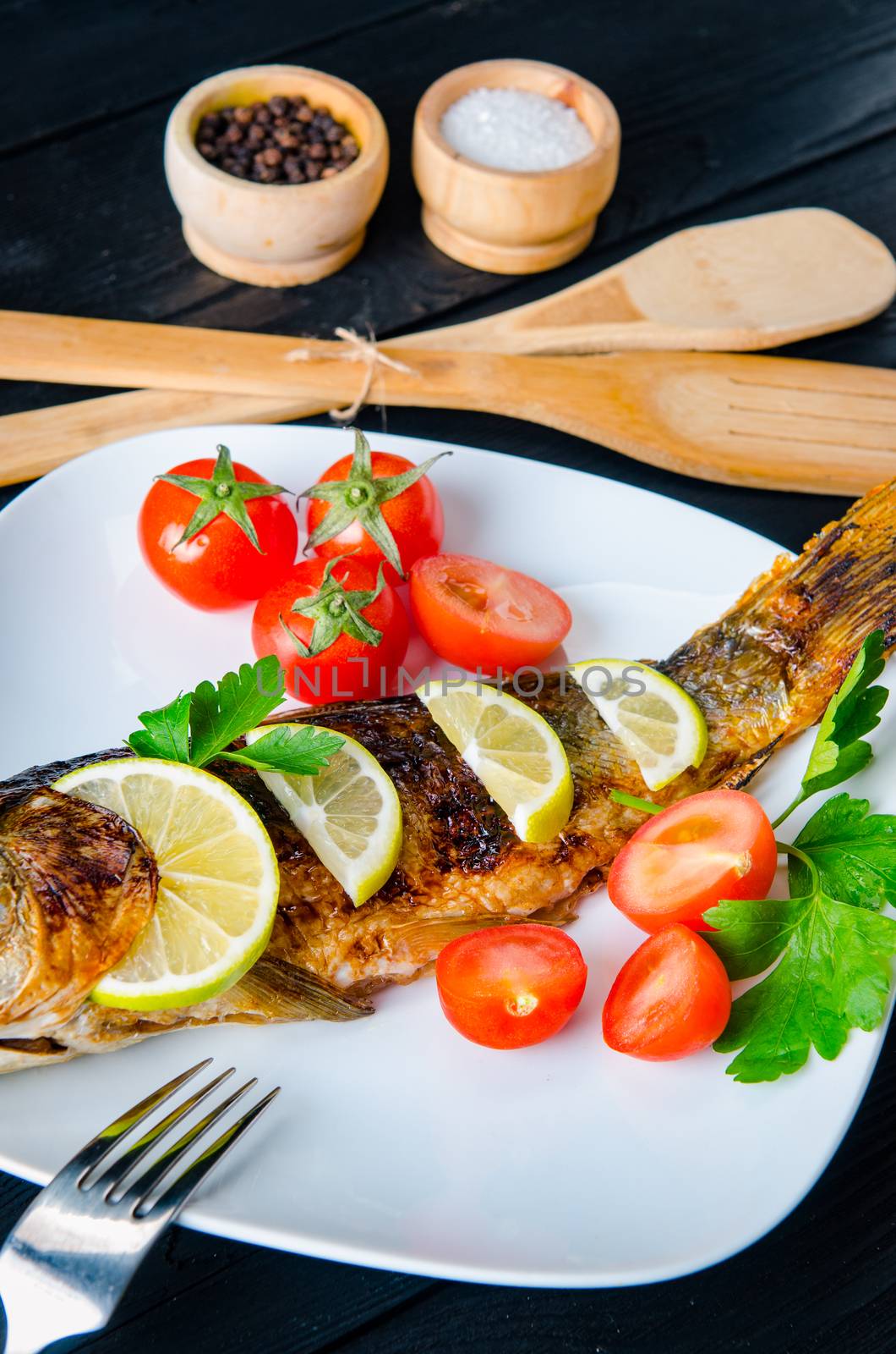 Fried fish served on the plate
