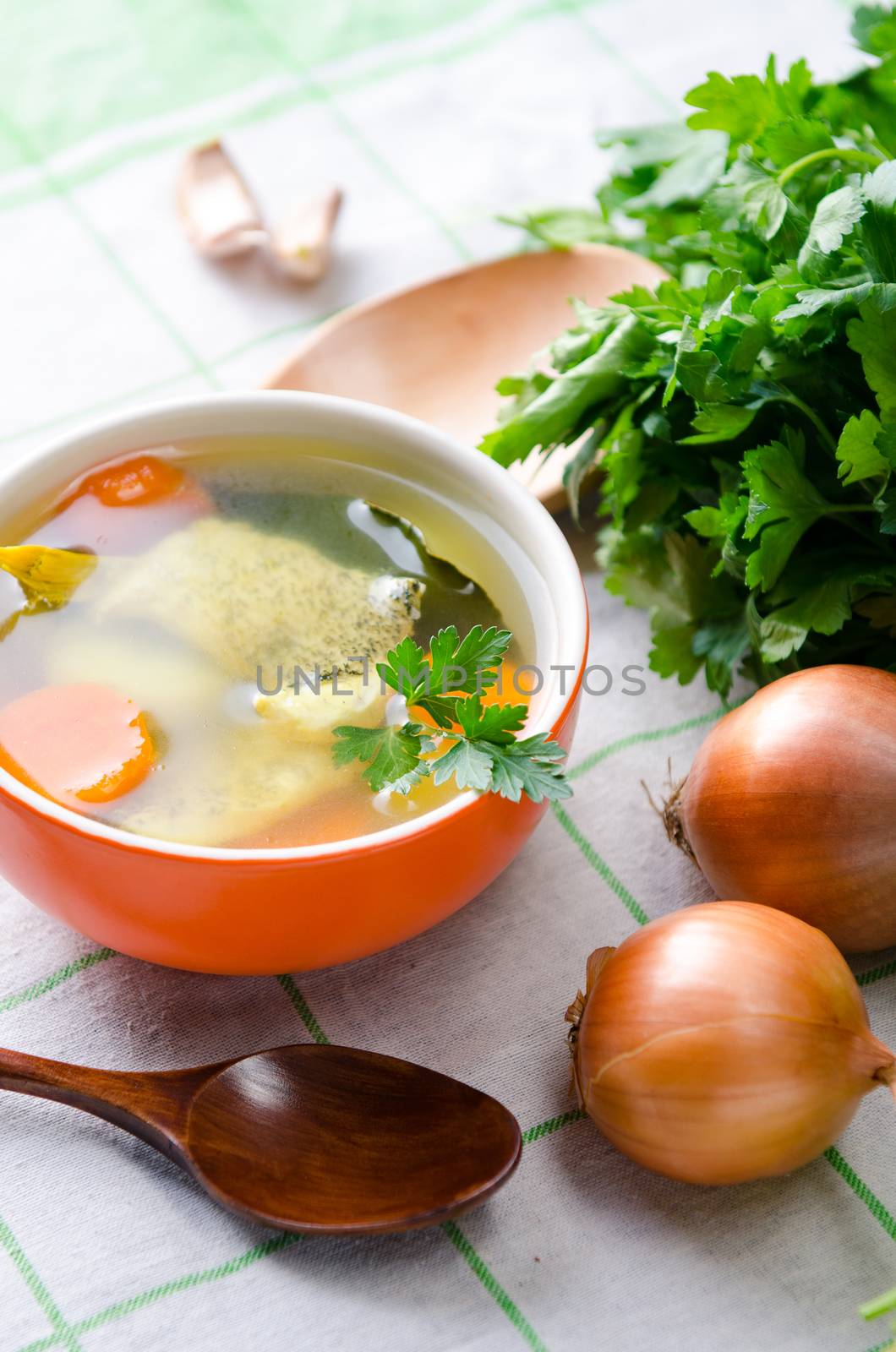 Fish soup served on the table in plate
