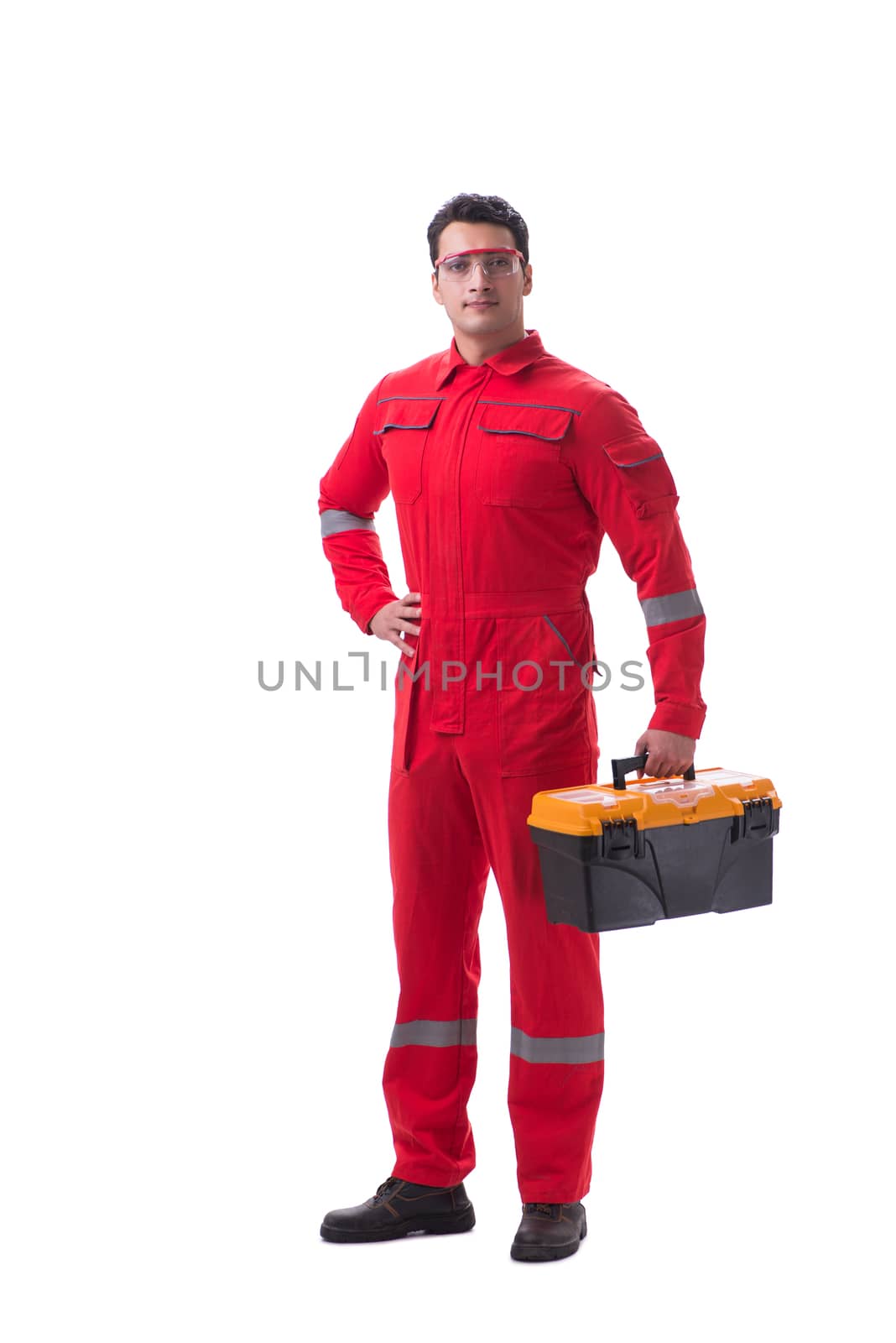 Contractor worker in red coveralls with toolbox isolated on white