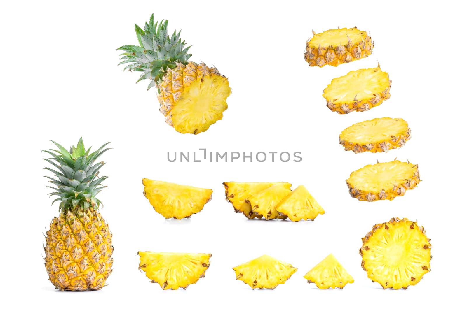 Collection of sliced pineapples isolated on white background. by wattanaphob