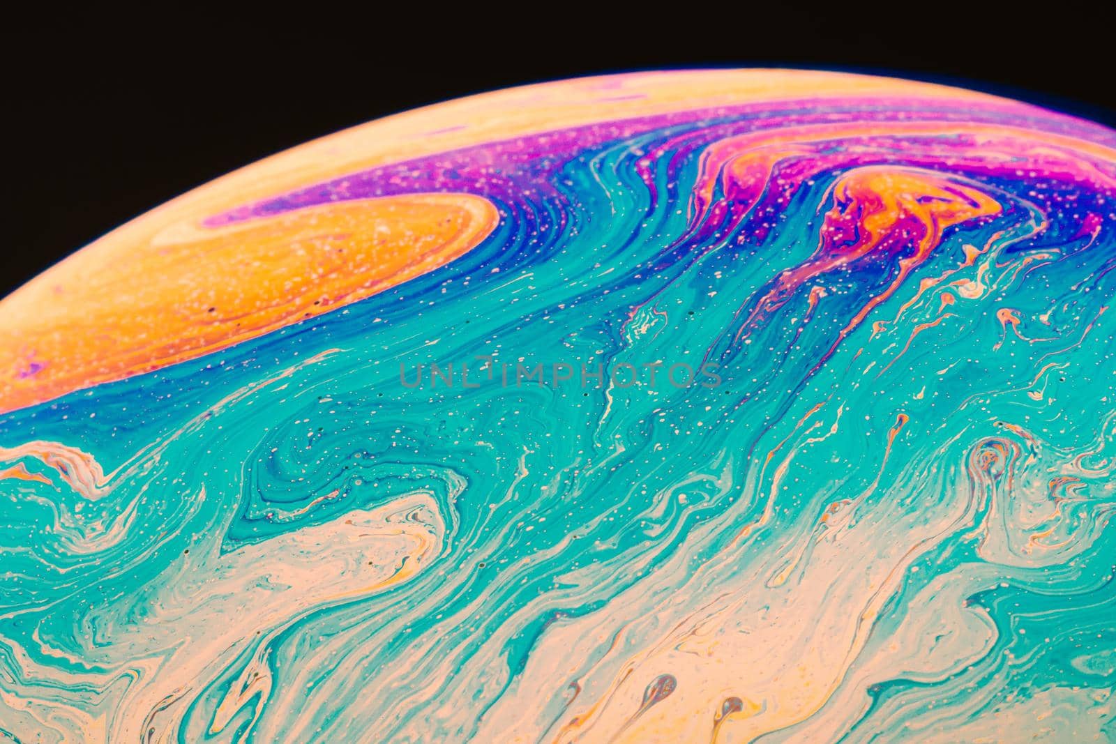 Fluid art made of colorful soap bubble film. Trendy Inkscape blurred background. Alien space planets art. Selective focus. by Frostroomhead