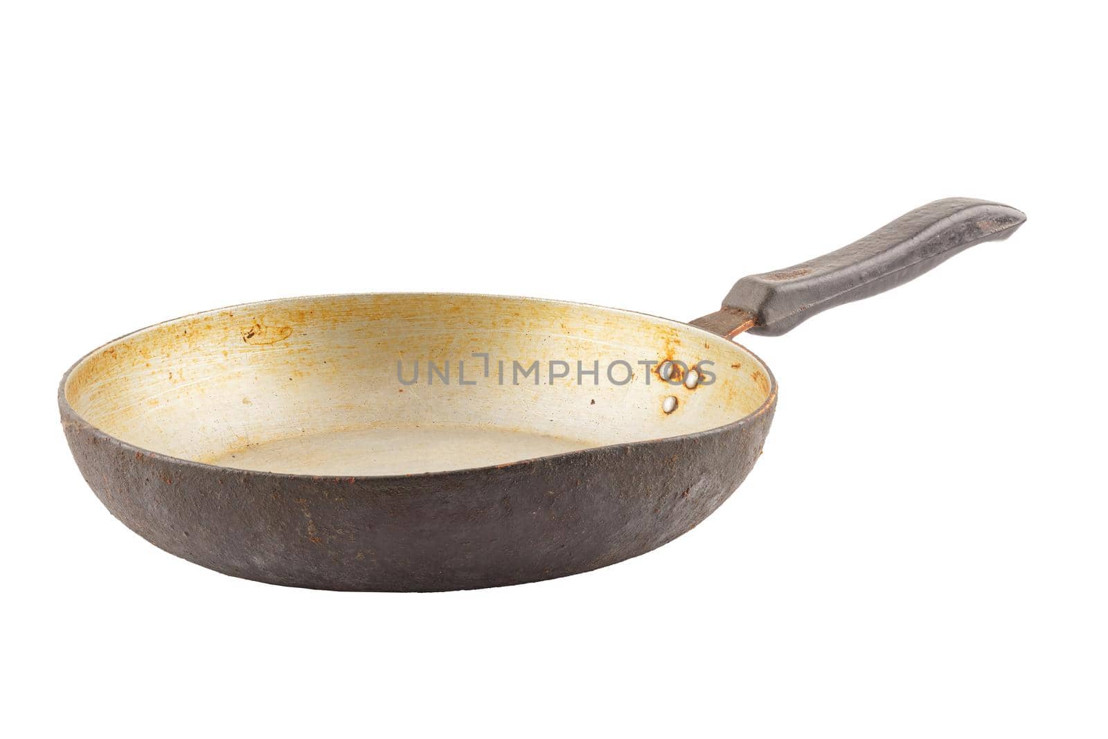 old stained aluminium pan with burnt fat isolated in white background.