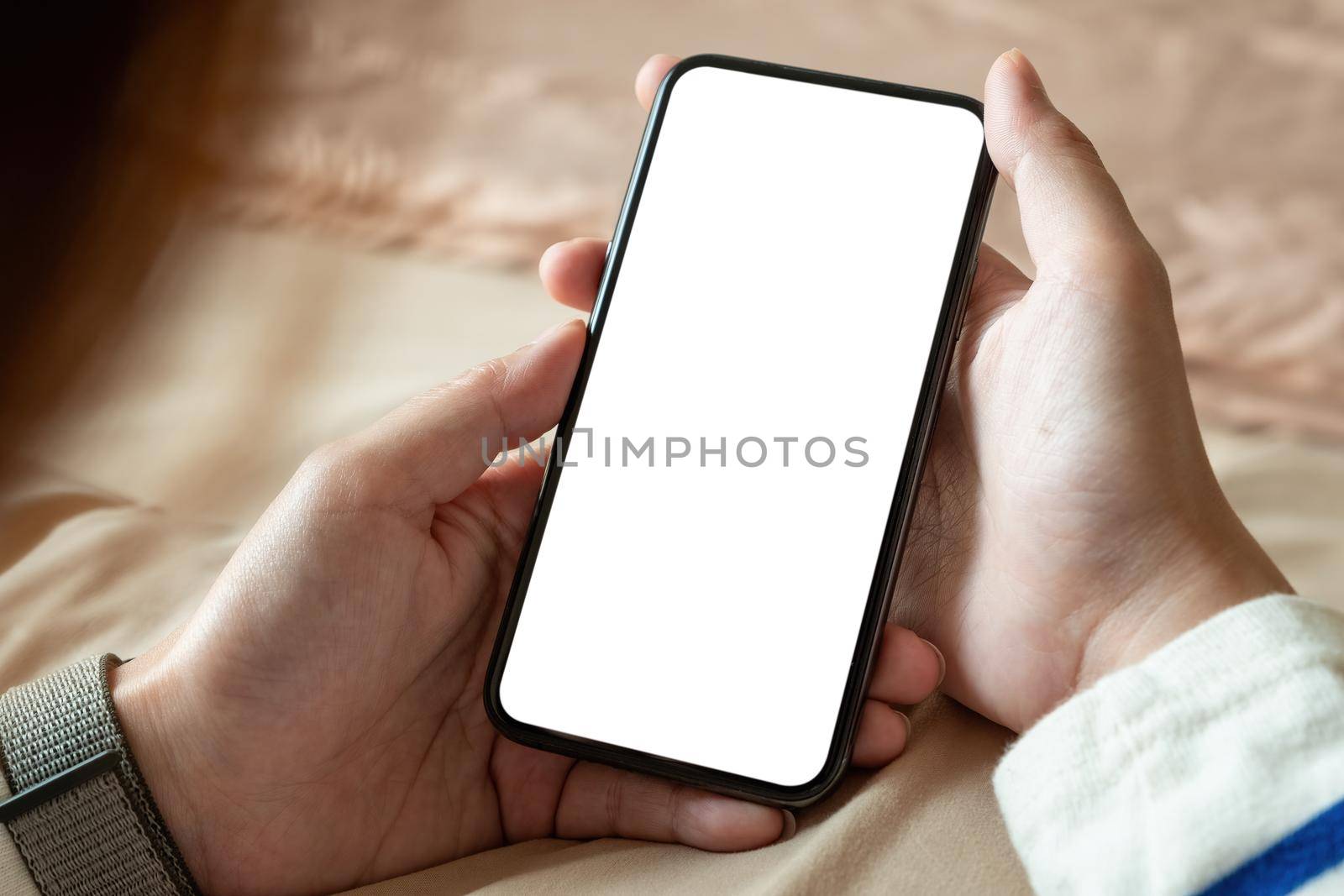 Close up of woman using cell phone with black screen, texting video calls,