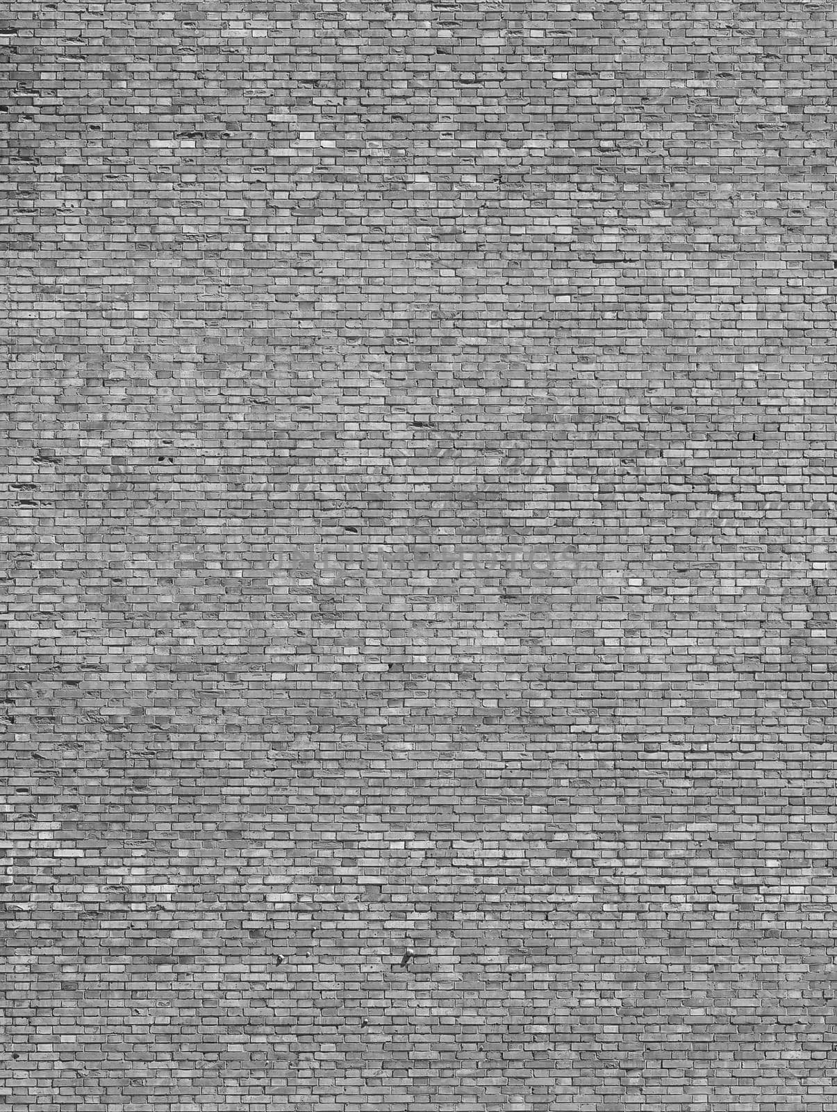 brick wall background in black and white by claudiodivizia