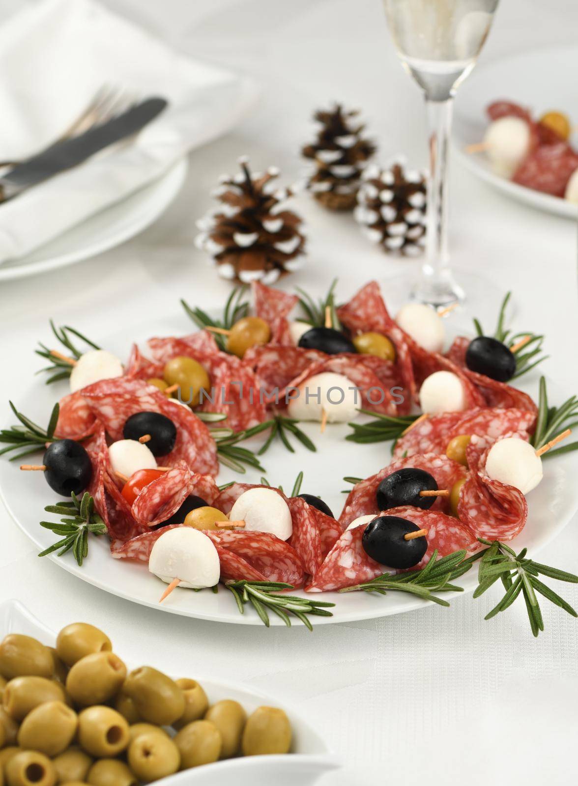  Christmas wreath - antipasto. Salami canapes with olives, baby mozzarella.