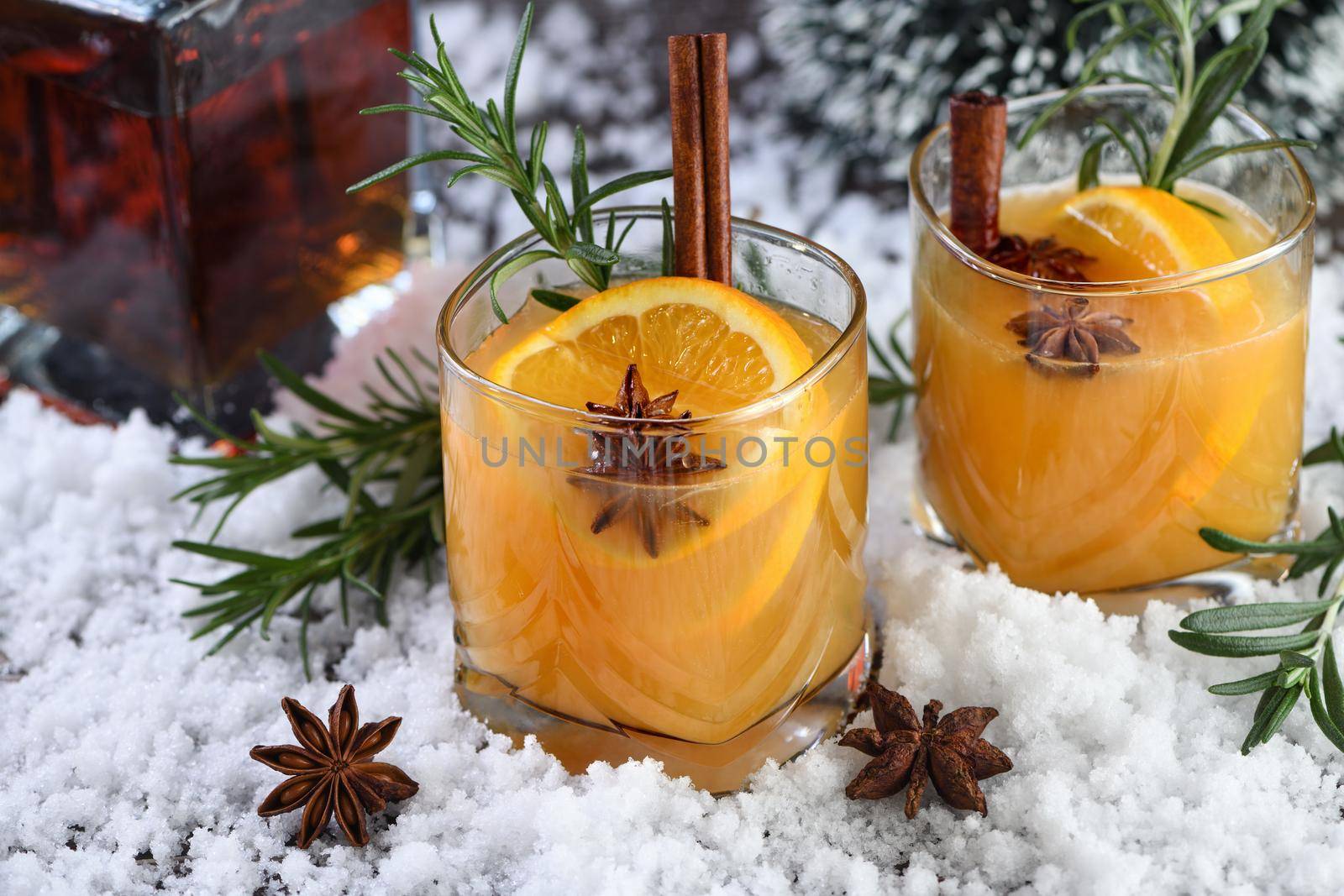 Negroni cocktail. Bourbon with cinnamon with oranges juice and star anise.The perfect cozy cocktail for chilly December evenings.