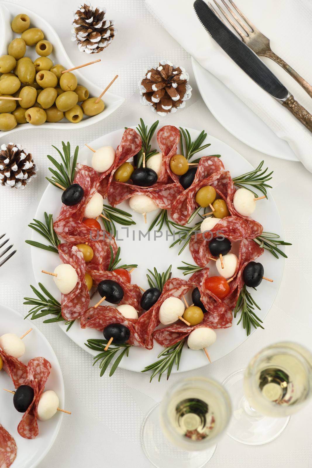  Christmas wreath - antipasto. Salami canapes with olives, baby mozzarella.