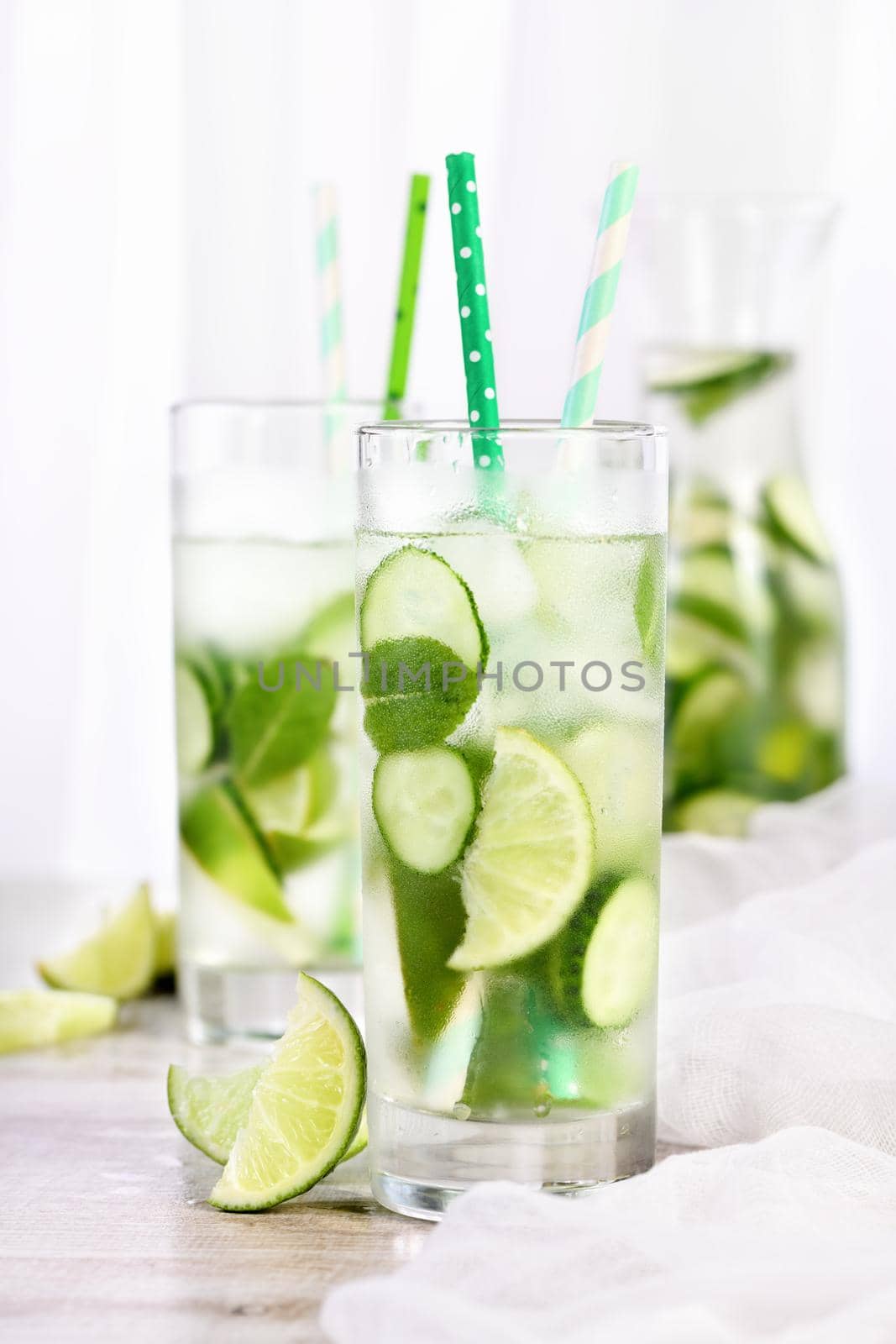 Refreshing tonic with slices of cucumber, mint, lime  by Apolonia