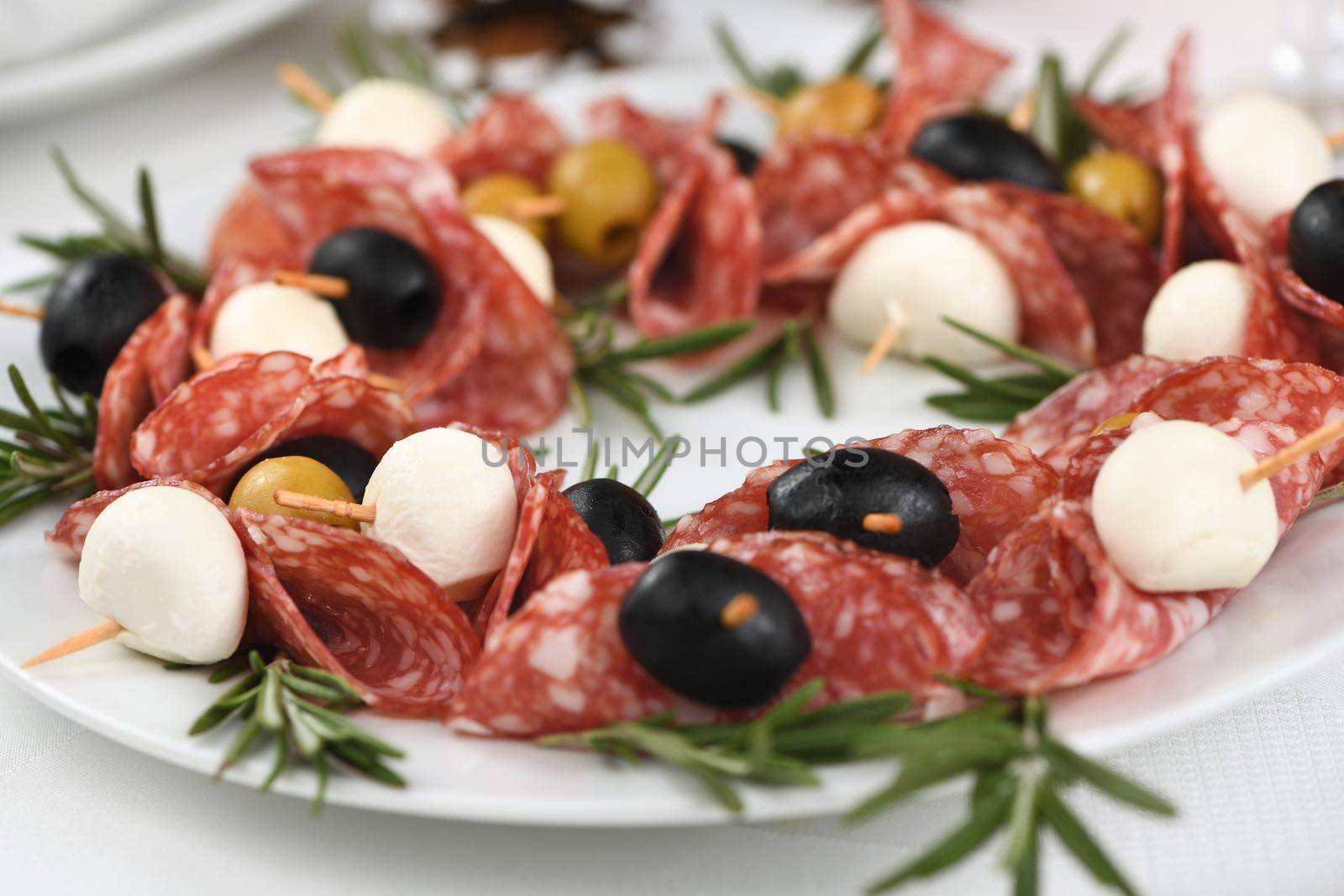  Christmas wreath - antipasto. Salami canapes with olives, baby mozzarella.
