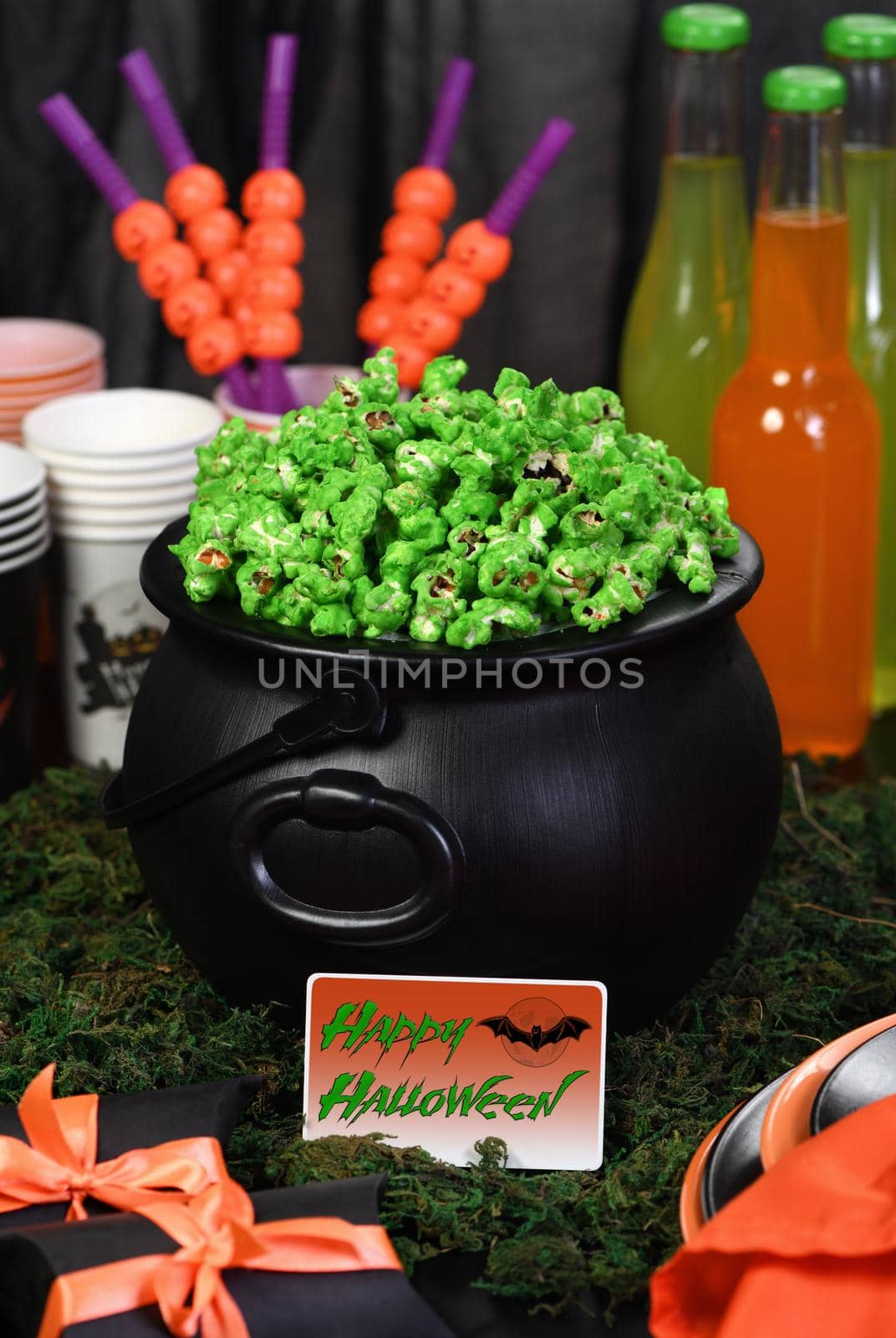 Cauldron green sweet popcorn for ghouls and zombies. Halloween treat